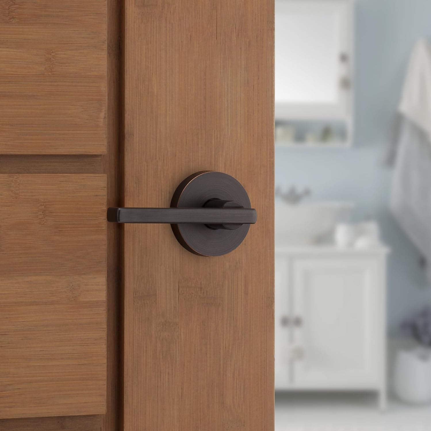 Kwikset Halifax Interior Privacy Door Handle with Lock, Round Lever for Bathroom and Bedroom, Venetian Bronze Reversible Keyless Push Button Lock Door Lever, with Microban Protection