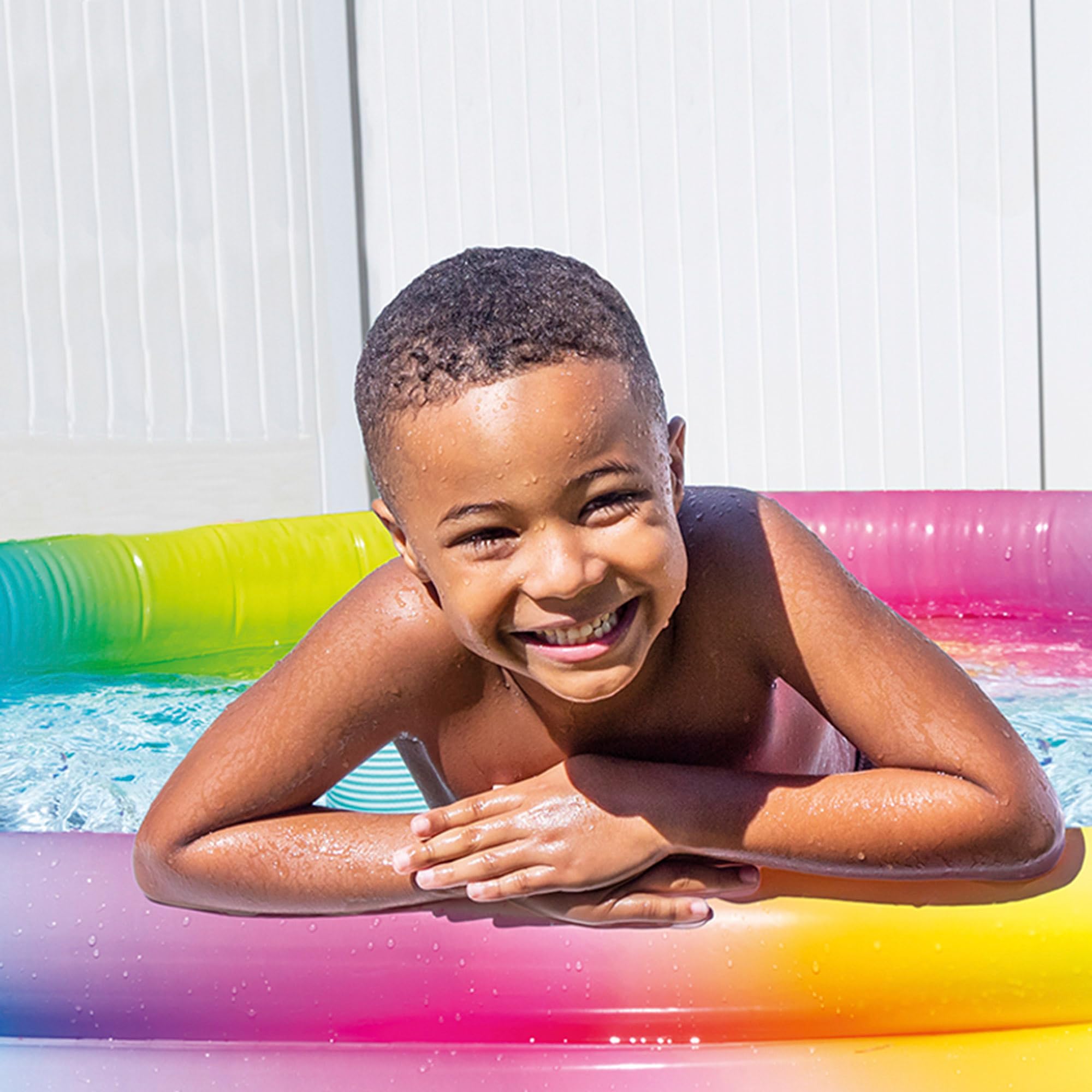 Intex Piscina Hinchable Infantil, 147x33 cm, 330 litros, diseño arcoíris, 3 cámaras de Aire con Doble válvula, Vinilo Resistente, Uso Exterior, Incluye Parche de reparación, niños +2 años (58439)