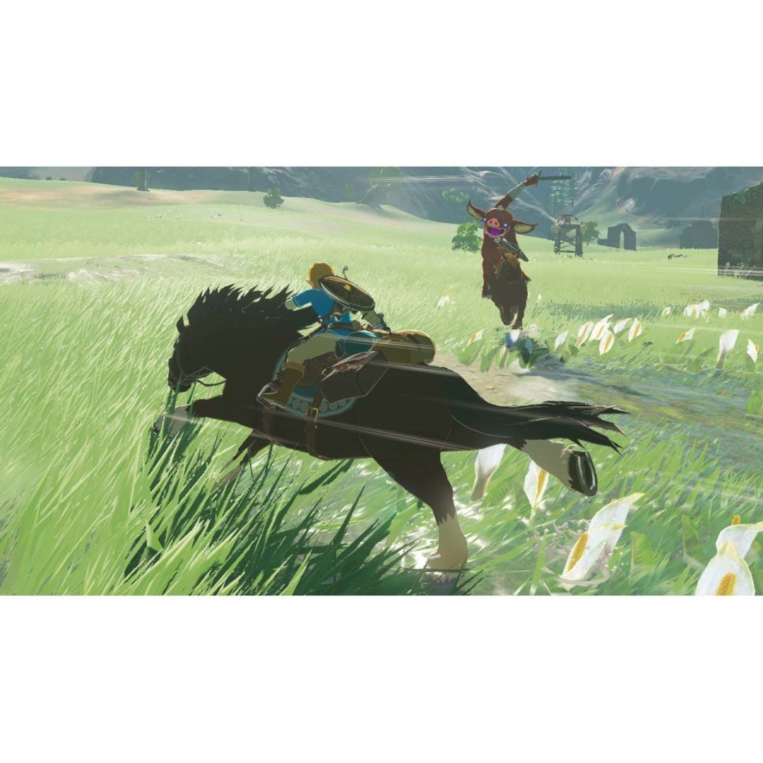 Nintendo Switch console Rouge/Bleu Néon 32Go [Nouveau modèle] + The Legend of Zelda: Breath of the Wild