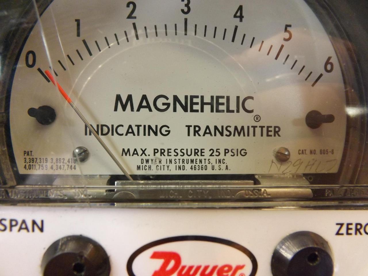 Close-up of the dial face of the Dwyer Magnehelic Series 605