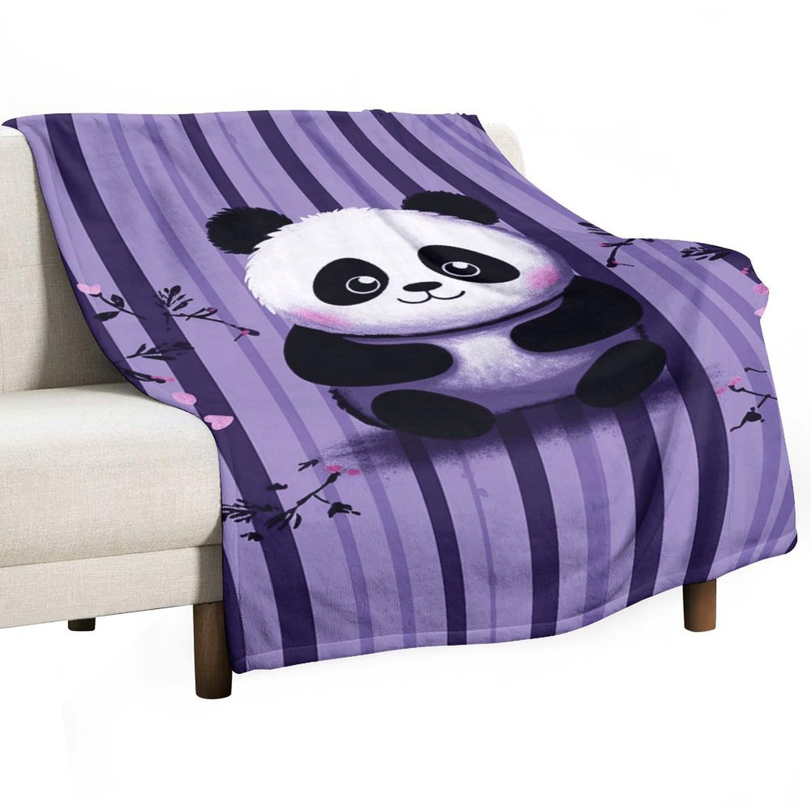 Couverture flanelle panda violette pour stopper le froid sur le canapé