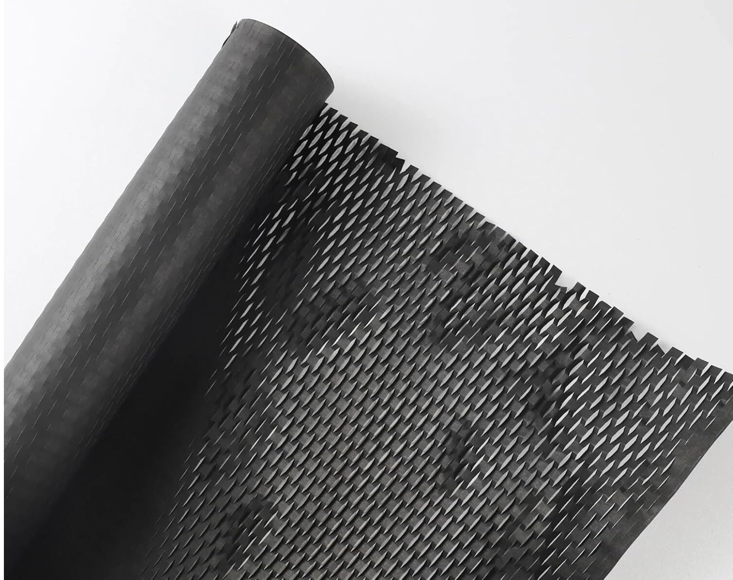 Le papier kraft noir doublé de nid d'abeille emballage colis antichoc et esthétique