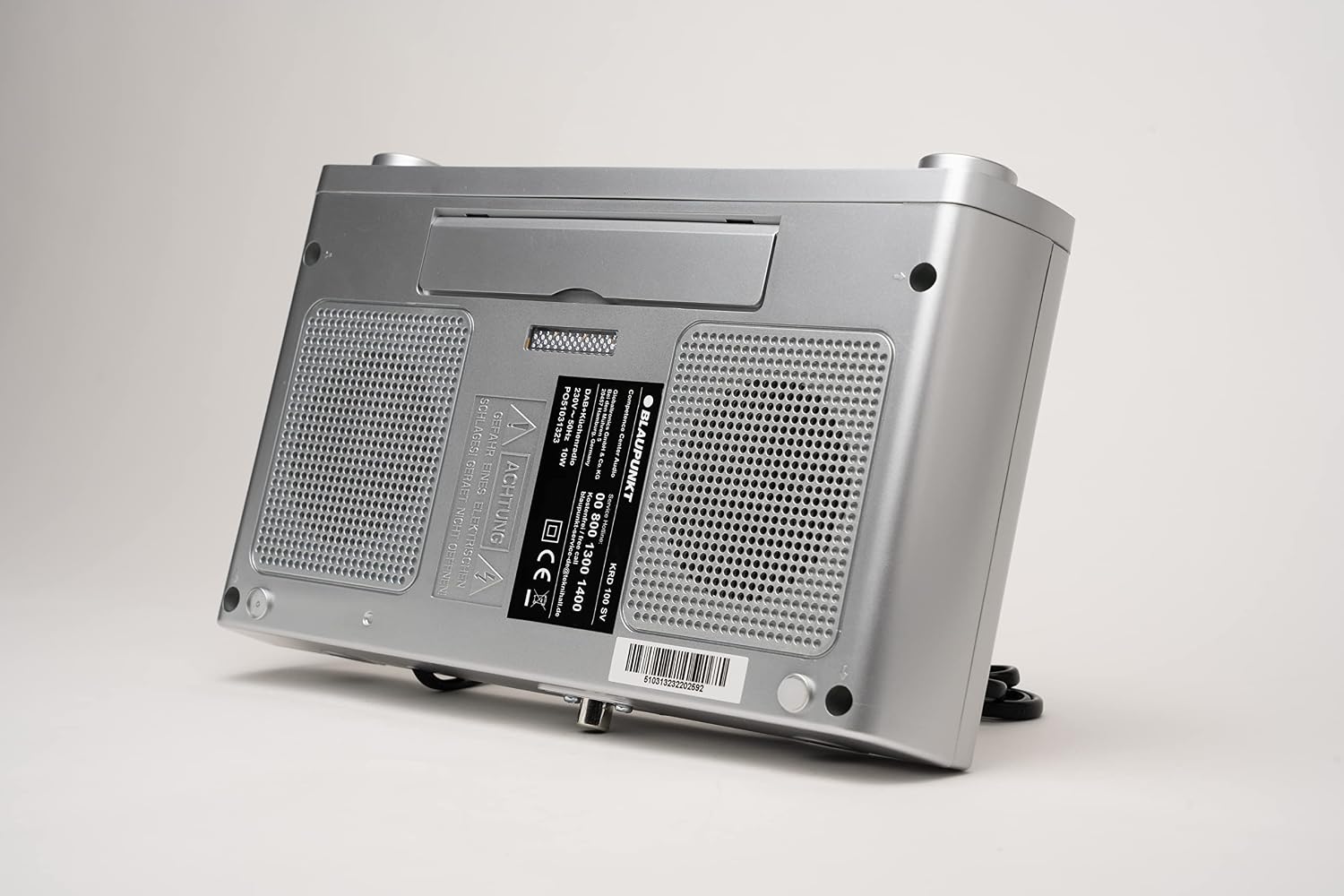 Indietro view of the Blaupunkt KRD 100 radio, showing the power input and antenna connection.