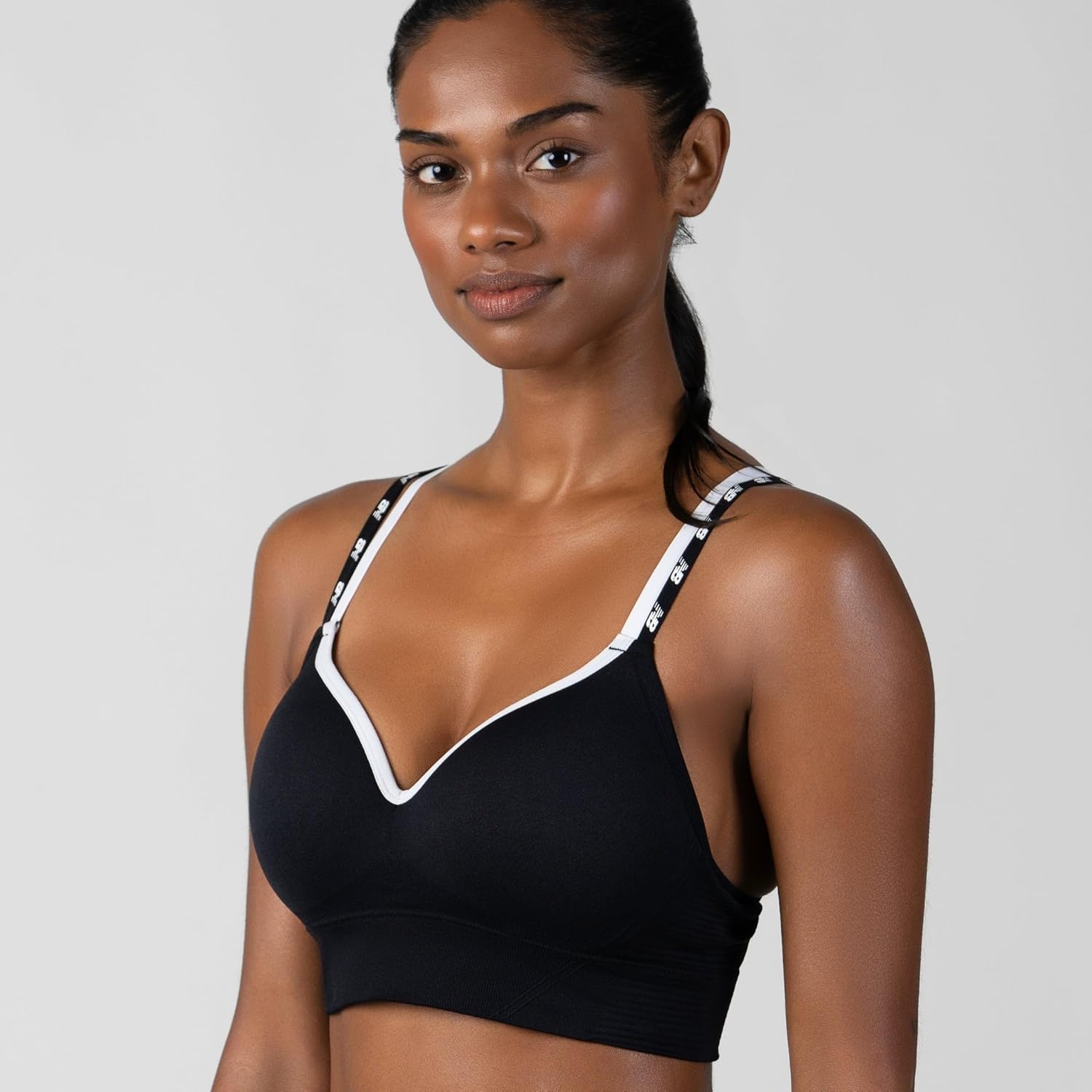 New Balance Women's Sports Bra with Molded Cups, High Impact Athletic Workout Set, Crisscross Strap, Seamless Bra for Women, - Image 3