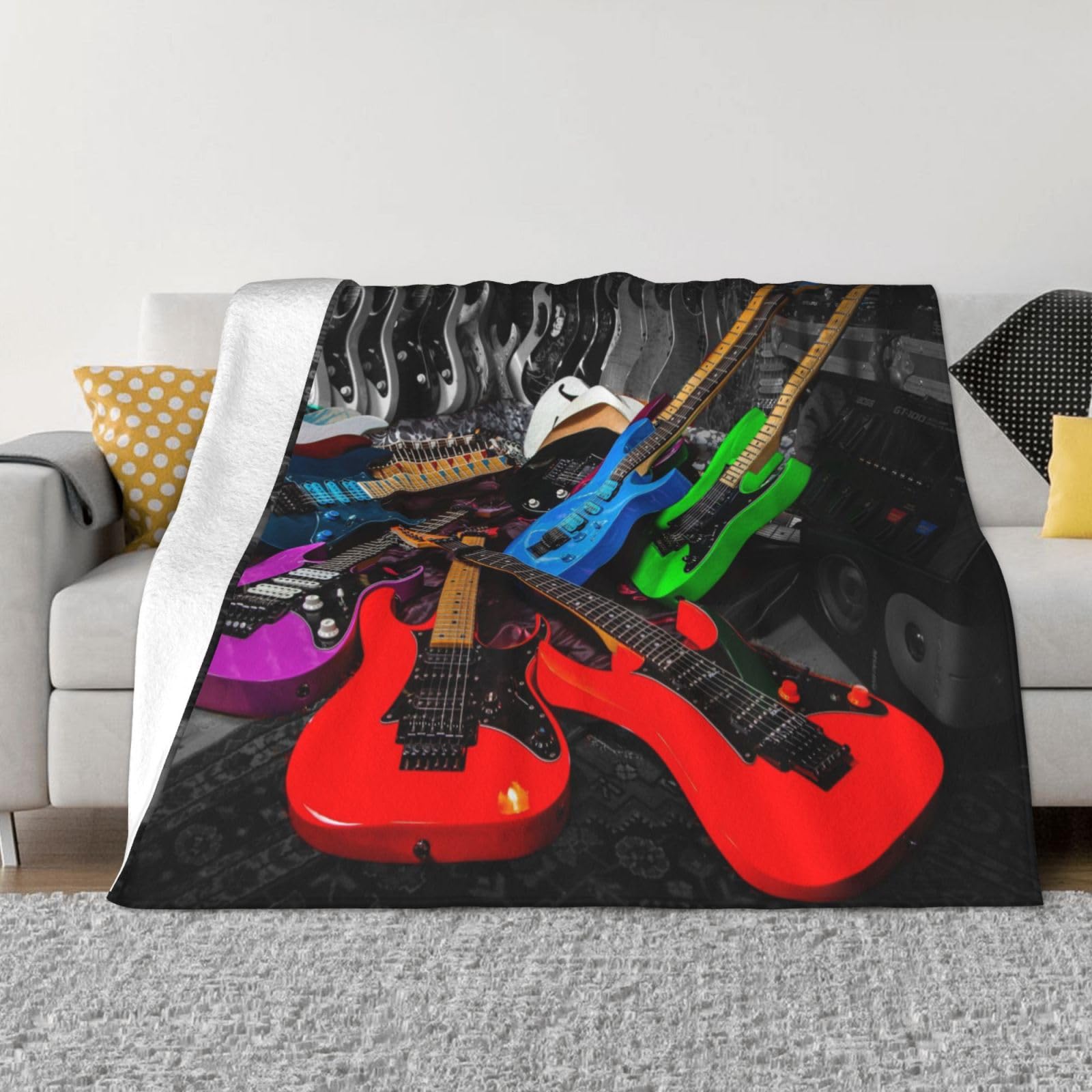 Plaid guitare en flanelle douce idéal pour vos soirées cinéma au salon