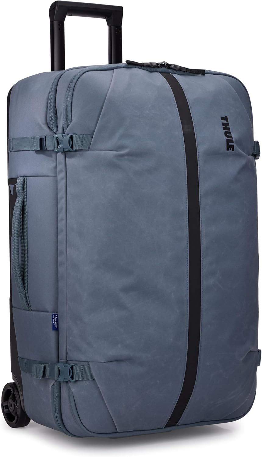 Thule Aion 70cm Wheeled Duffel - Wet/Dirty Storage Pocket - Smooth Rolling Wheels - Interior Compression Straps - Lockable Exterior Zippers - 100% Recycled PFC-Free Waxed Canvas Fabric