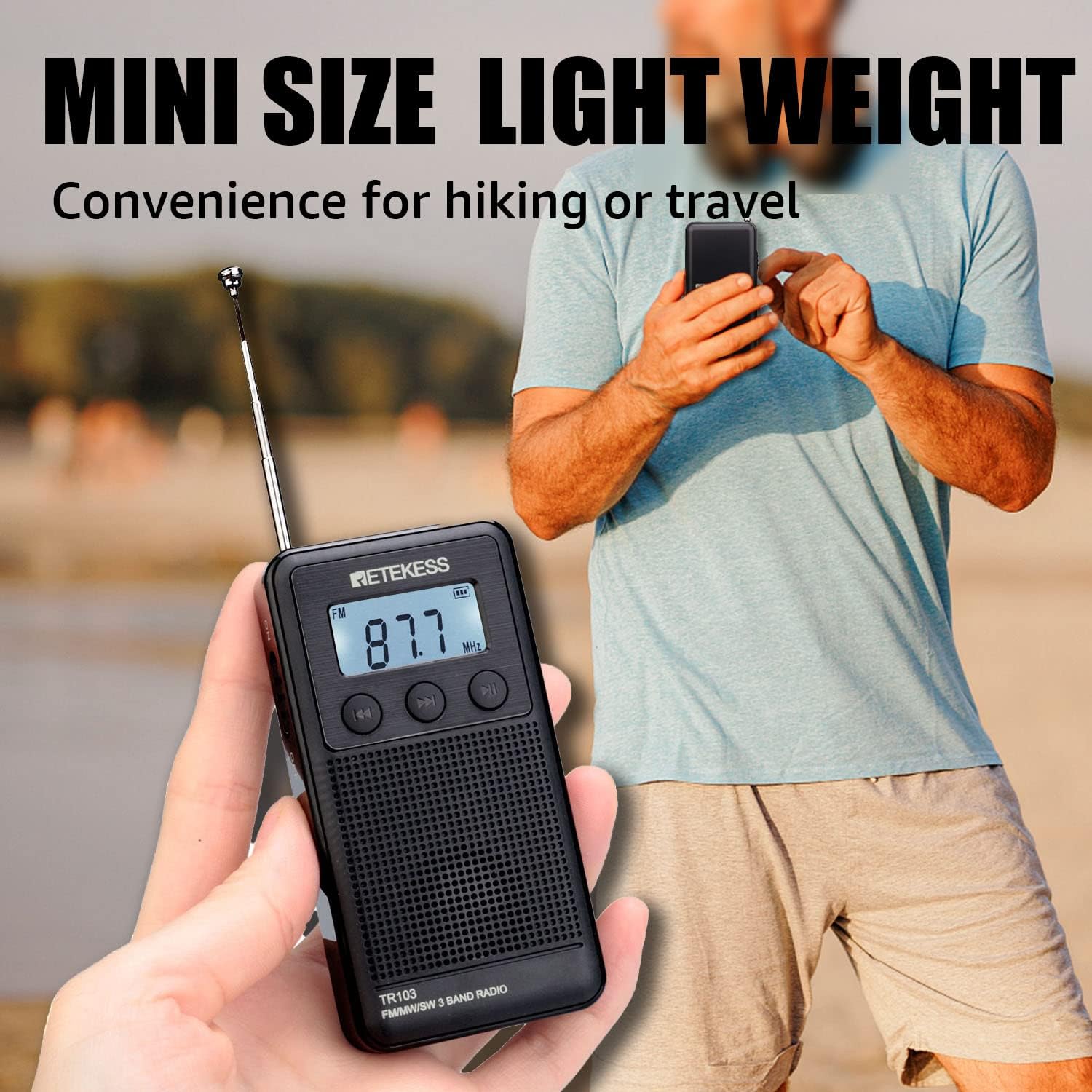 Retekess TR103 radio held in a hand, showing its mini size and light weight