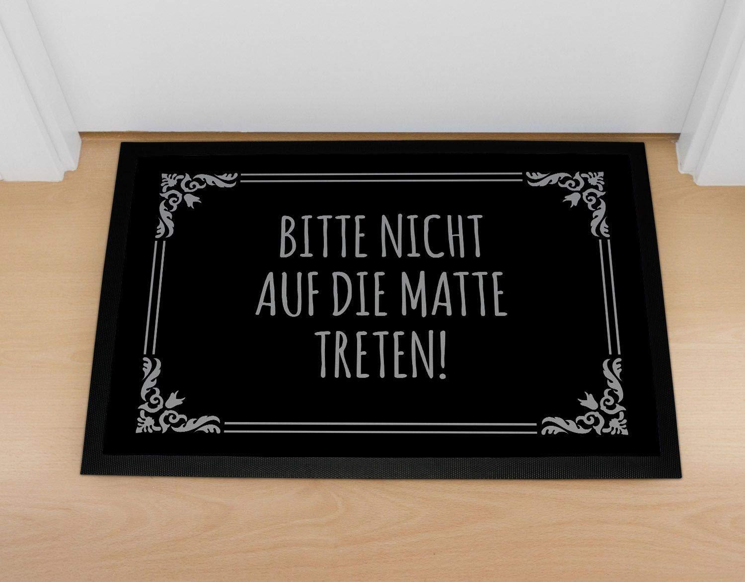 MoonWorks® Fußmatte 'Wie Schön DASS Du Da Bist' – Rutschfeste & Waschbare Schmutzmatte (60x40 Cm, Schwarz)