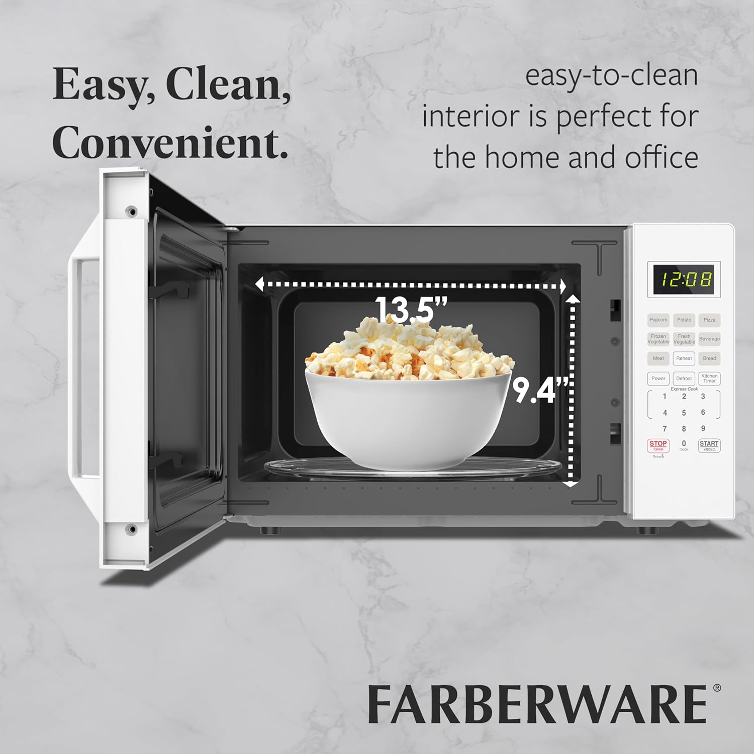 Interior view of the Farberware FMO11WEIWH microwave with a bowl of popcorn on the turntable, demonstrating its easy-to-clean design.