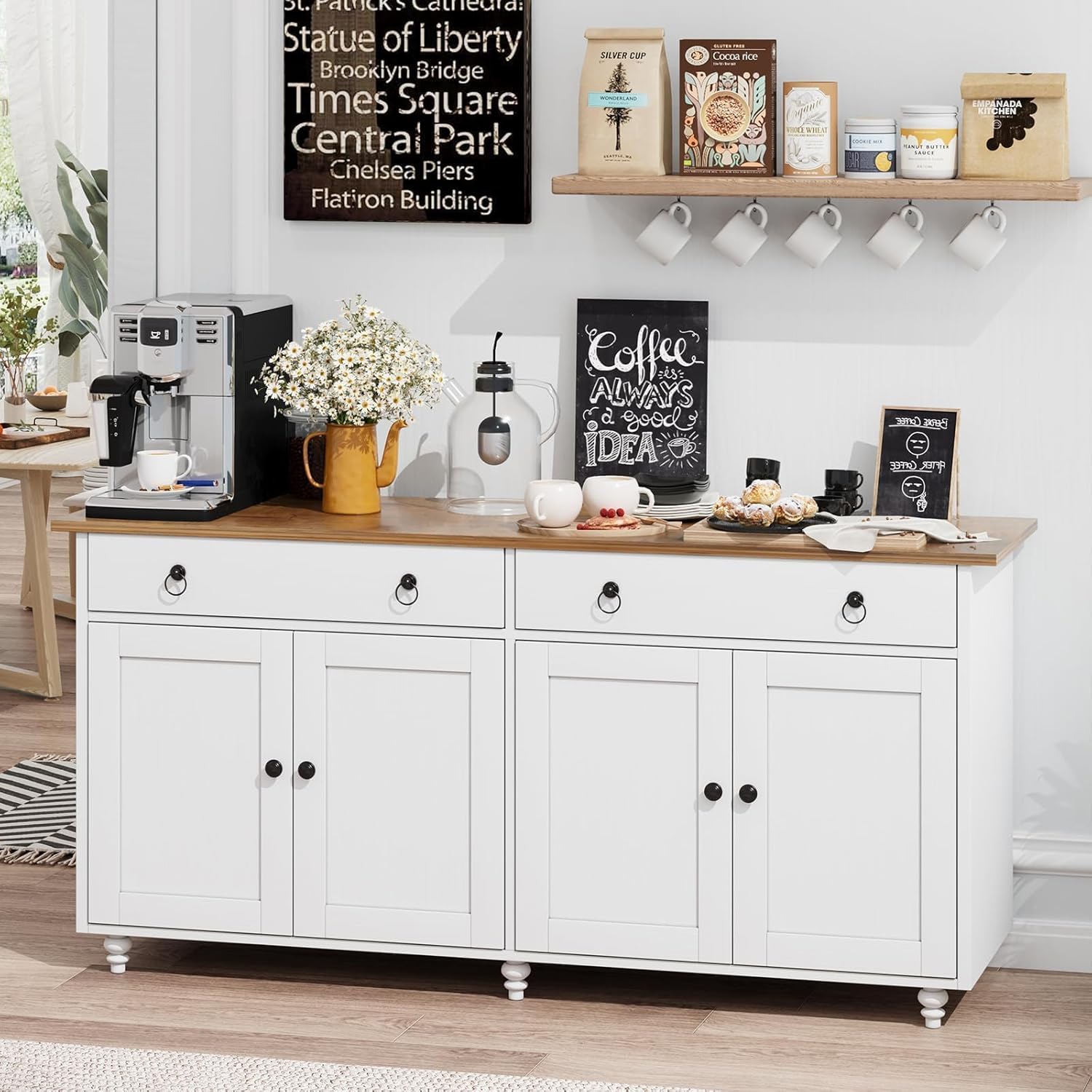 White buffet cabinet used as a coffee bar with a coffee machine, mugs, and snacks on top.
