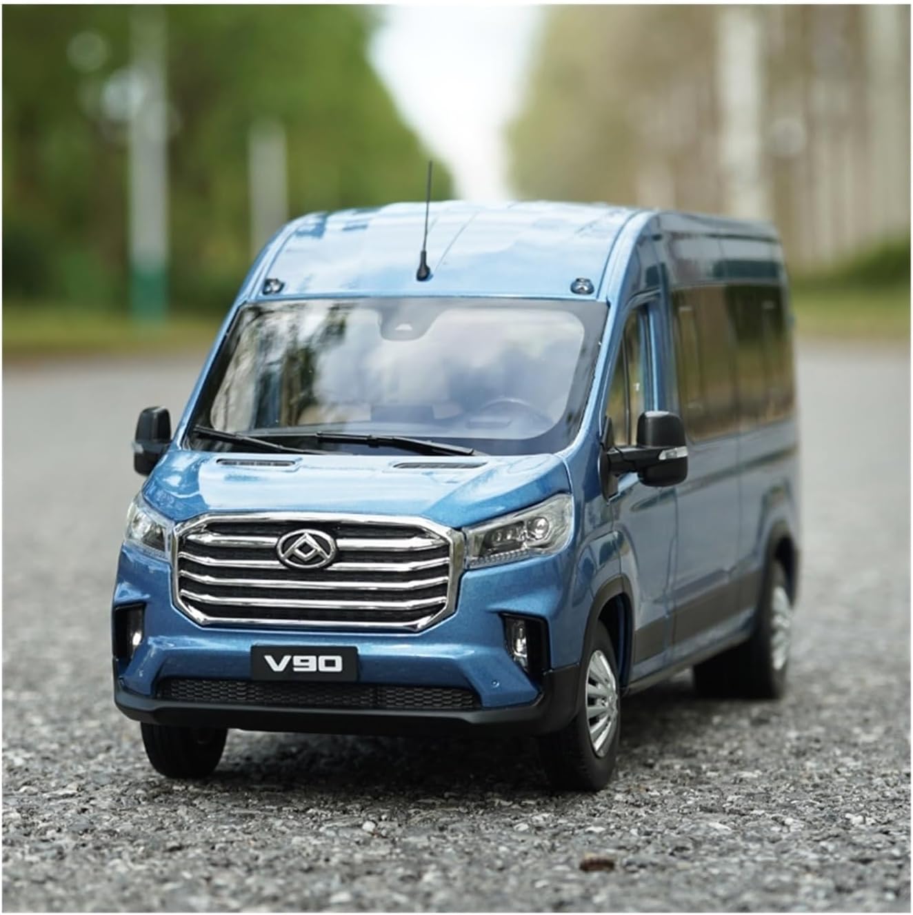 Front angled view of the blue MAXUS V90 model van