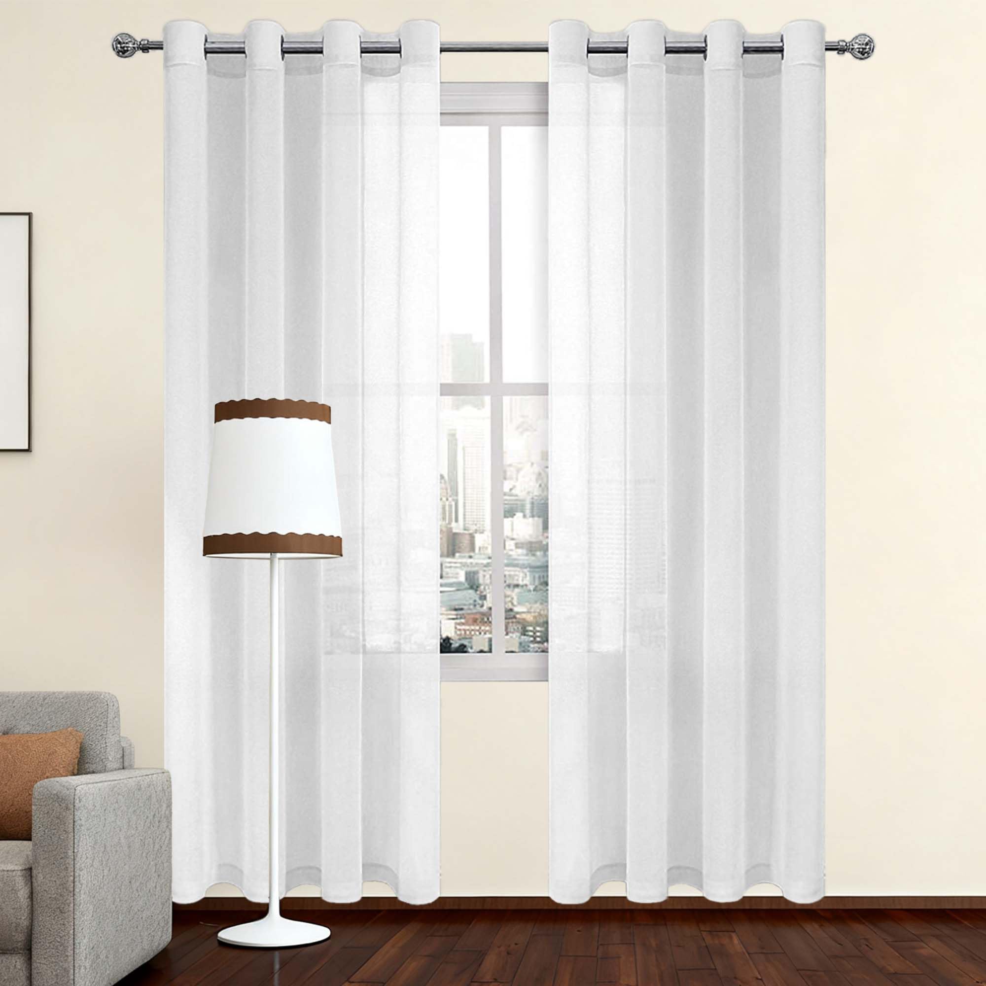 Rideau voilage transparent à oeillets pour créer une ambiance douce dans le salon