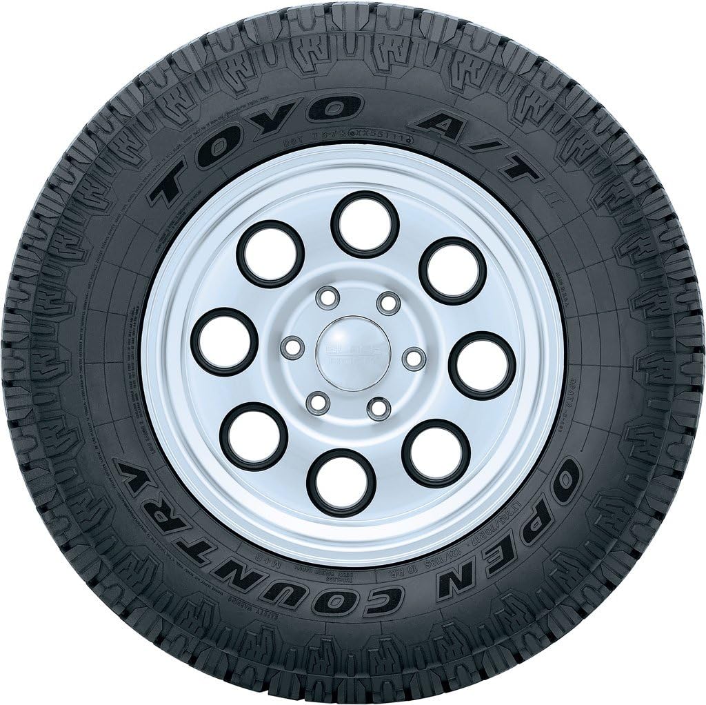 Buy Toyo Open Country At2 All Terrain Radial Tire 265 75r16 123r Online In Indonesia B009x237ds