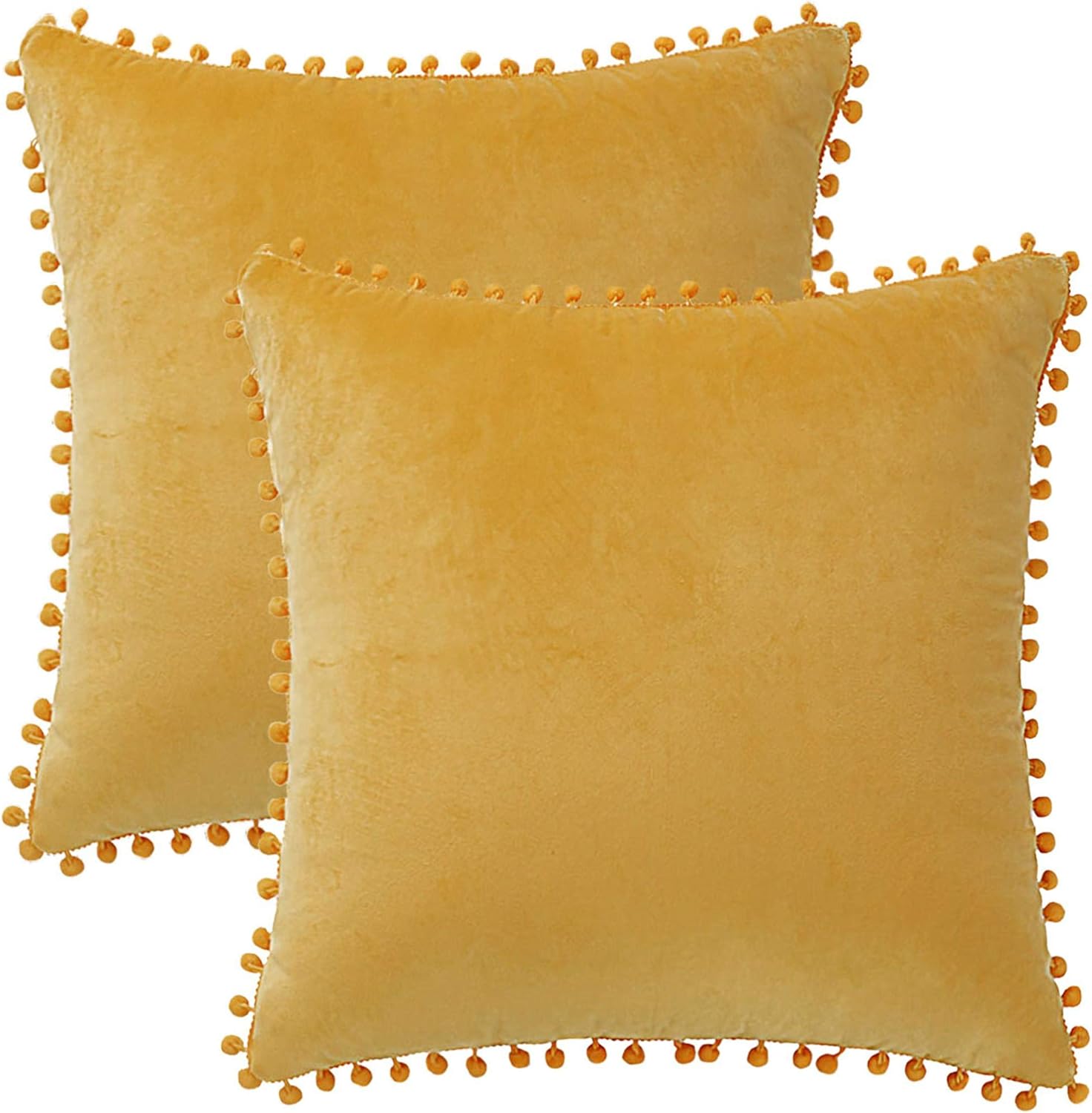 yellow pom pom pillow