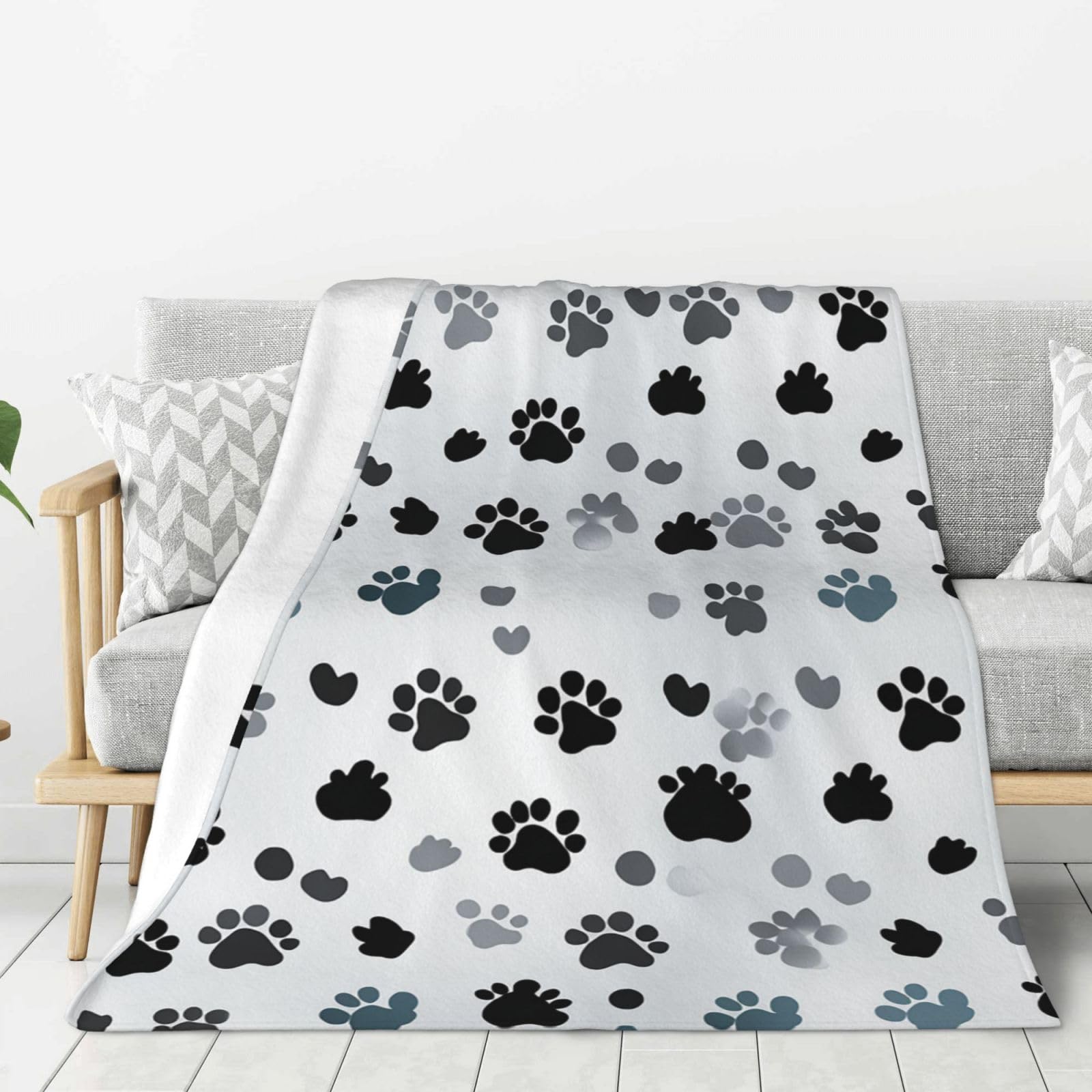 Couverture en flanelle douce et chaude motif pattes pour des moments de tendresse
