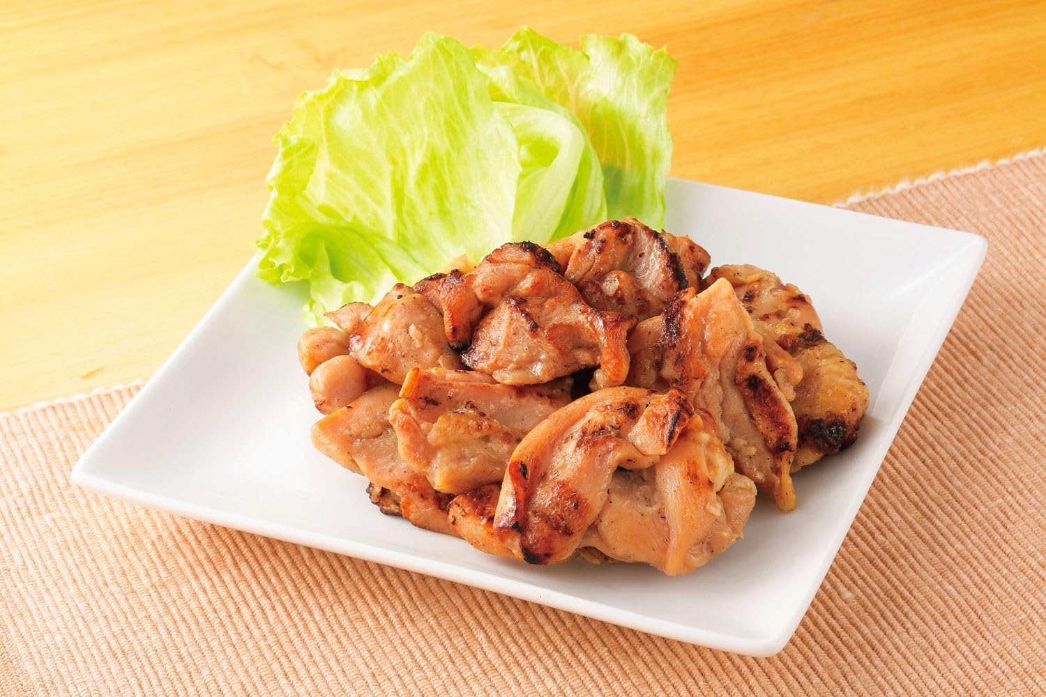 Amazon | [冷凍] ニチレイフーズ 炭火焼鶏ももカットIQF 500g 3222700