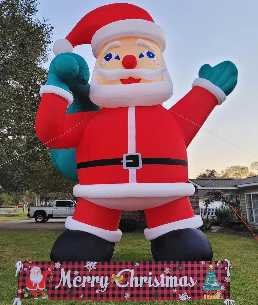 OZIS Giant 26Ft Inflatable Santa Claus Holding Bag with Blower Outdoor Decorations, Huge Inflatable Santa Blow Up Yard Décor for Holiday Patio Lawn