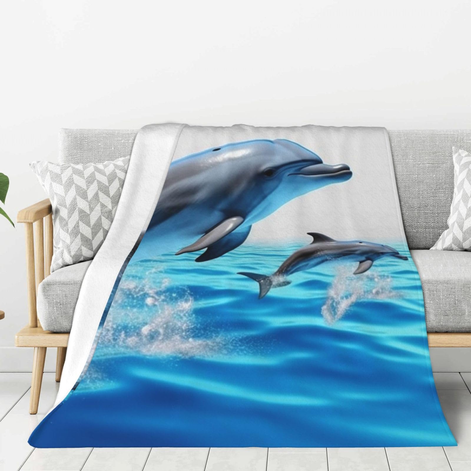 Couverture dauphin flanelle légère pour des soirées cocooning au salon
