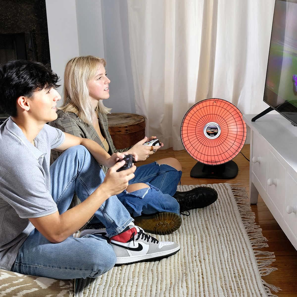 Presto HeatDish Plus Parabolic Heater with integrated cord storage.