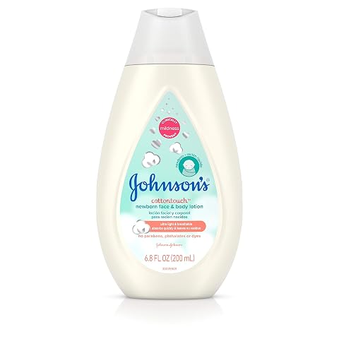 JOHNSON'S Cotton Touch Newborn Baby Face and Body Lotion, Made with Real Cotton 27.1 oz