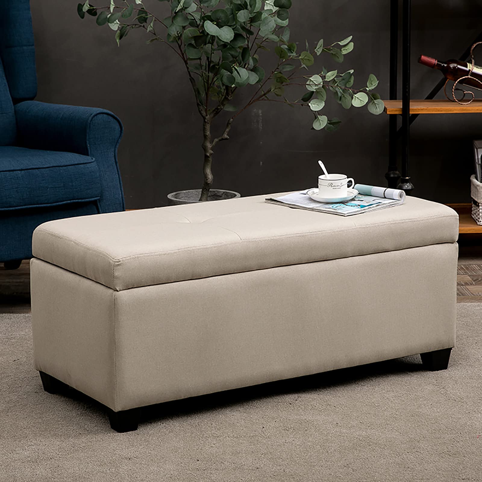 Pouf de rangement rectangulaire en lin capitonné servant de table basse