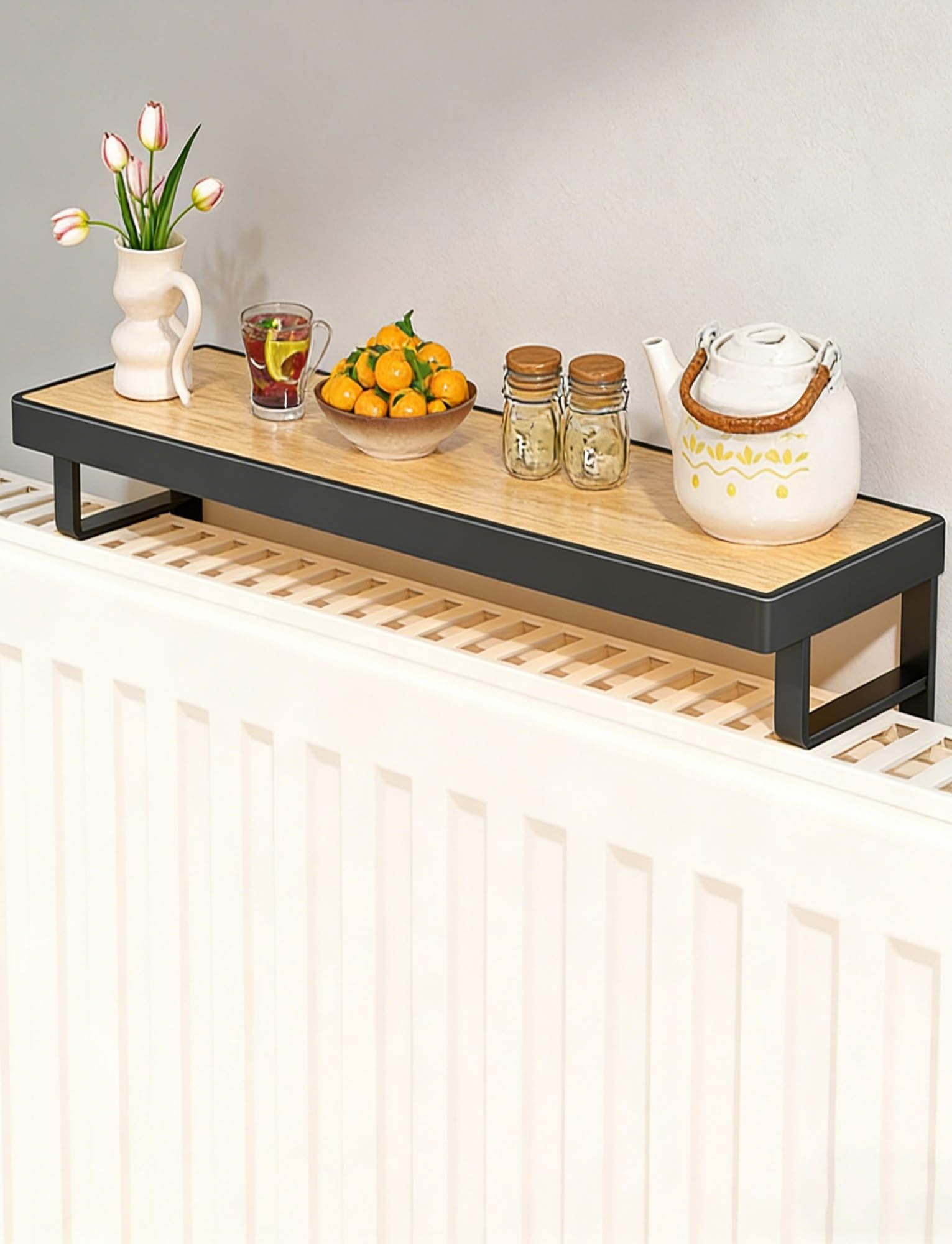 Questa mensola Galleggiante in Legno per termosifone, Senza Bisogno di forare, Misura 40 cm/15,7 Pollici ed è Un Elegante ripiano di Copertura Nero per termosifone.