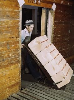 Refrigerator Car 1943 Nman Loading Oranges Into A Refrigerated Railroad Car At A Co-Op Orange Packing Plant In California Photograph By Jack Delano 1943 Poster Print by (18 x 24)