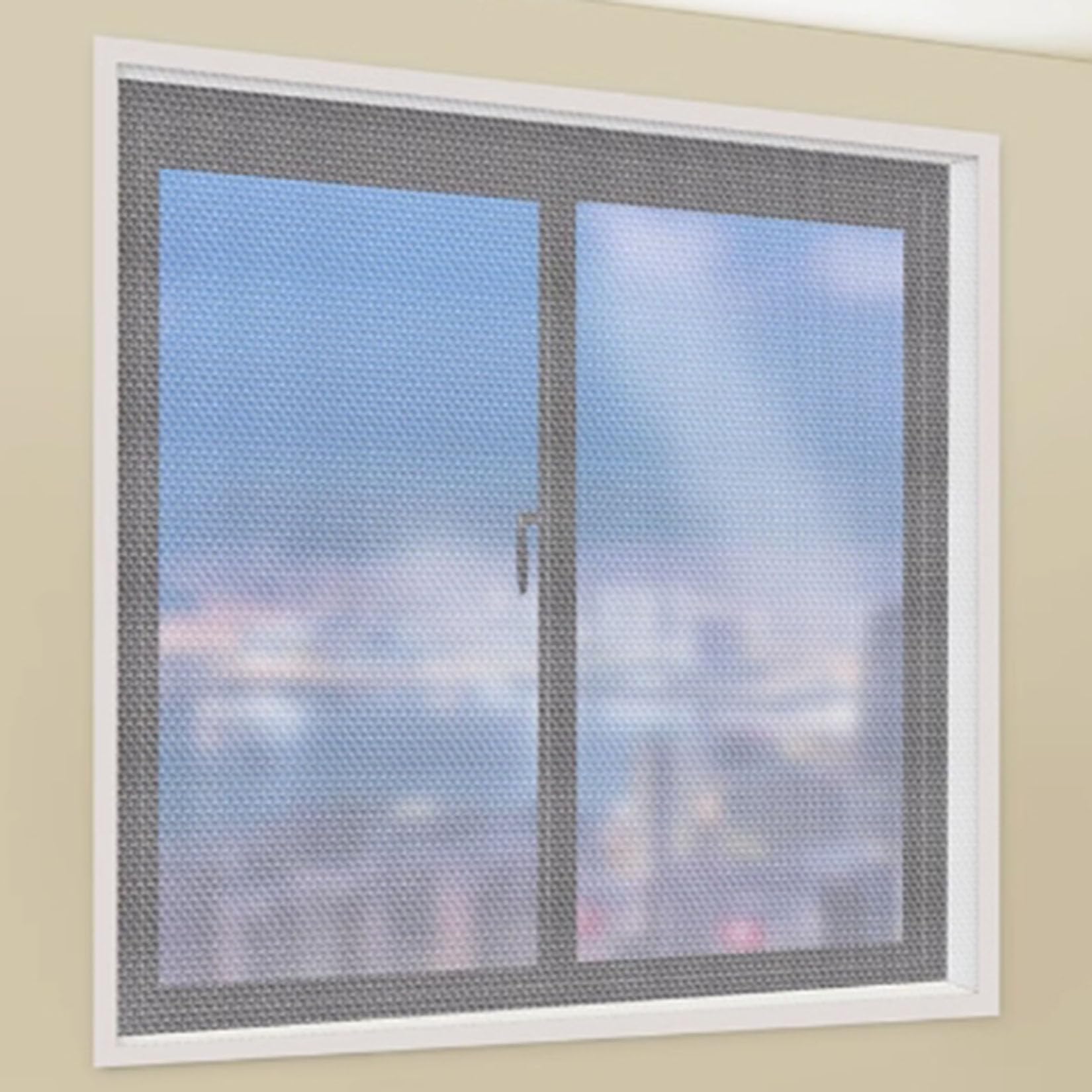 Film isolant de fenêtre pour l'hiver pour réchauffer durablement votre salon face au froid