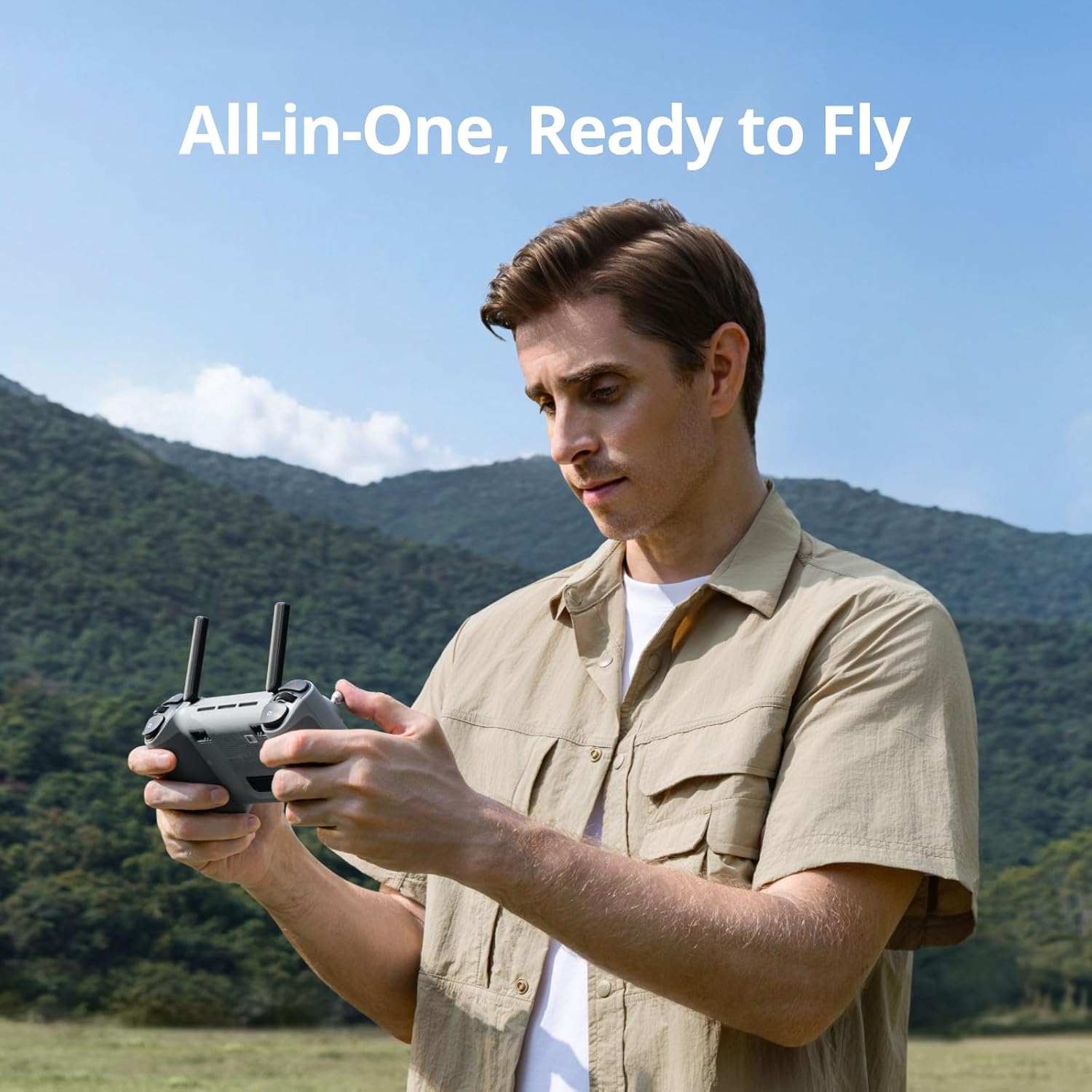 Man holding Potensic PTD 1 Remote Controller, ready to fly