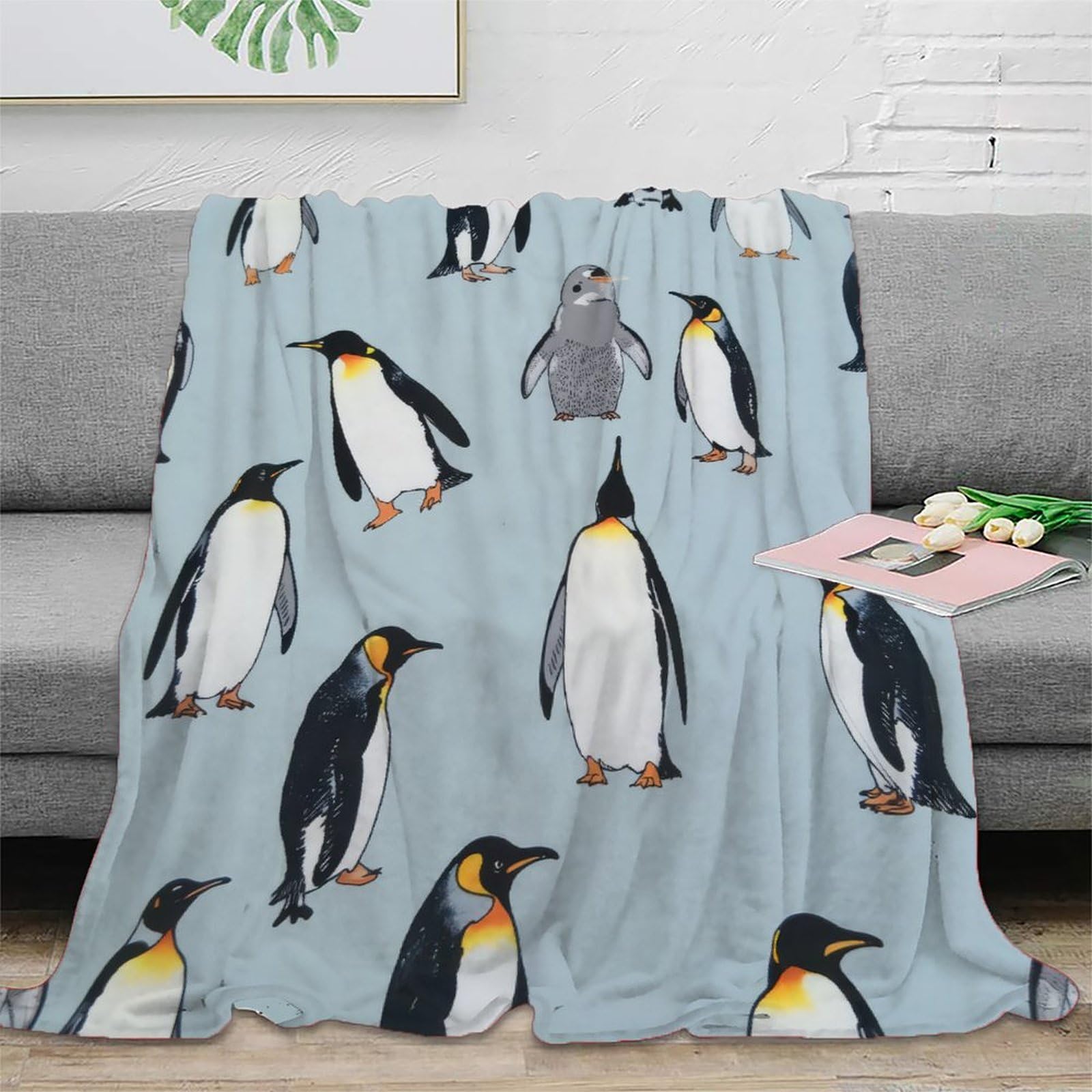 Couverture pingouin respirante pour soirée cocooning canapé en couple
