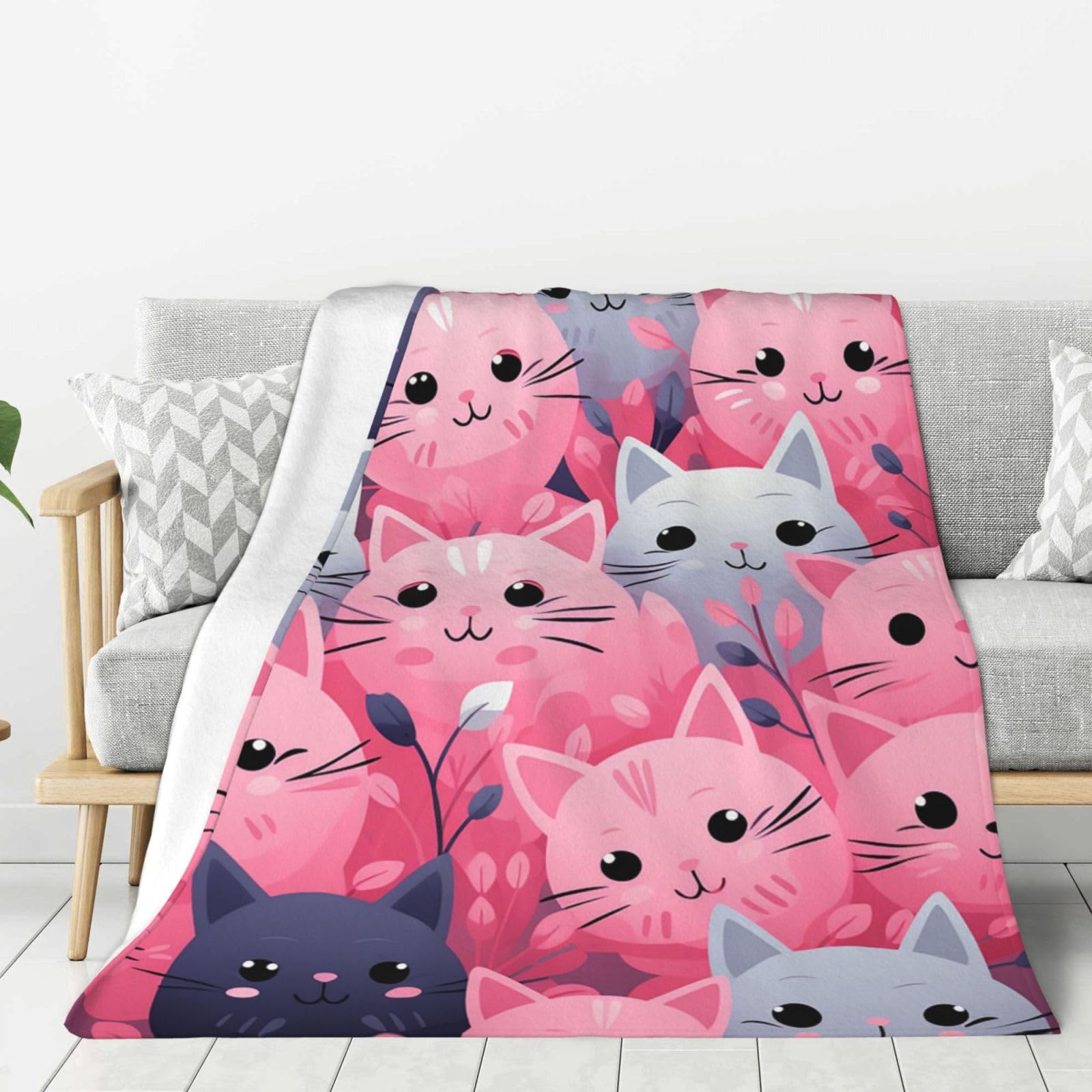 Plaid chat rose en flanelle douce : une couverture enveloppante pleine de tendresse