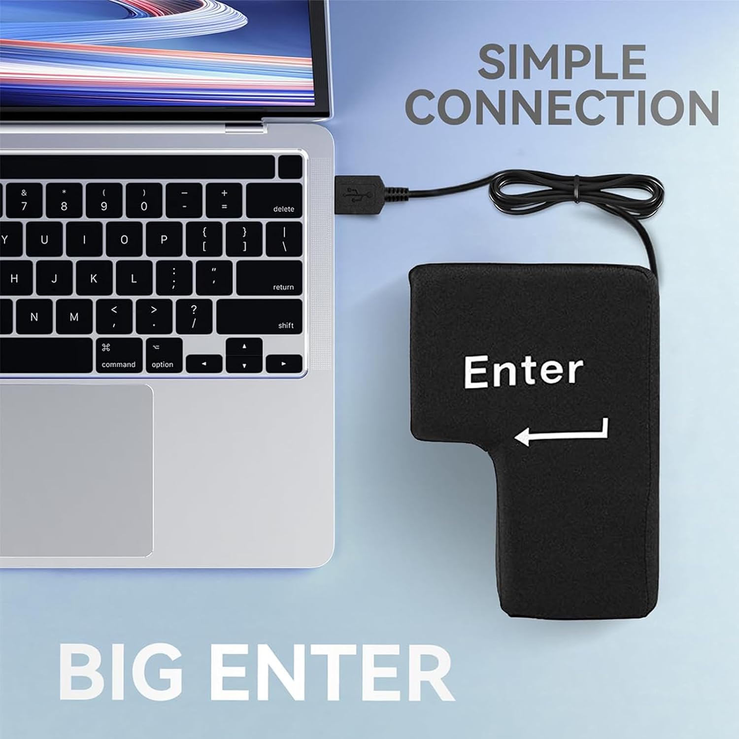 Close-up of the Giant Enter Key's USB cable connecting to a laptop