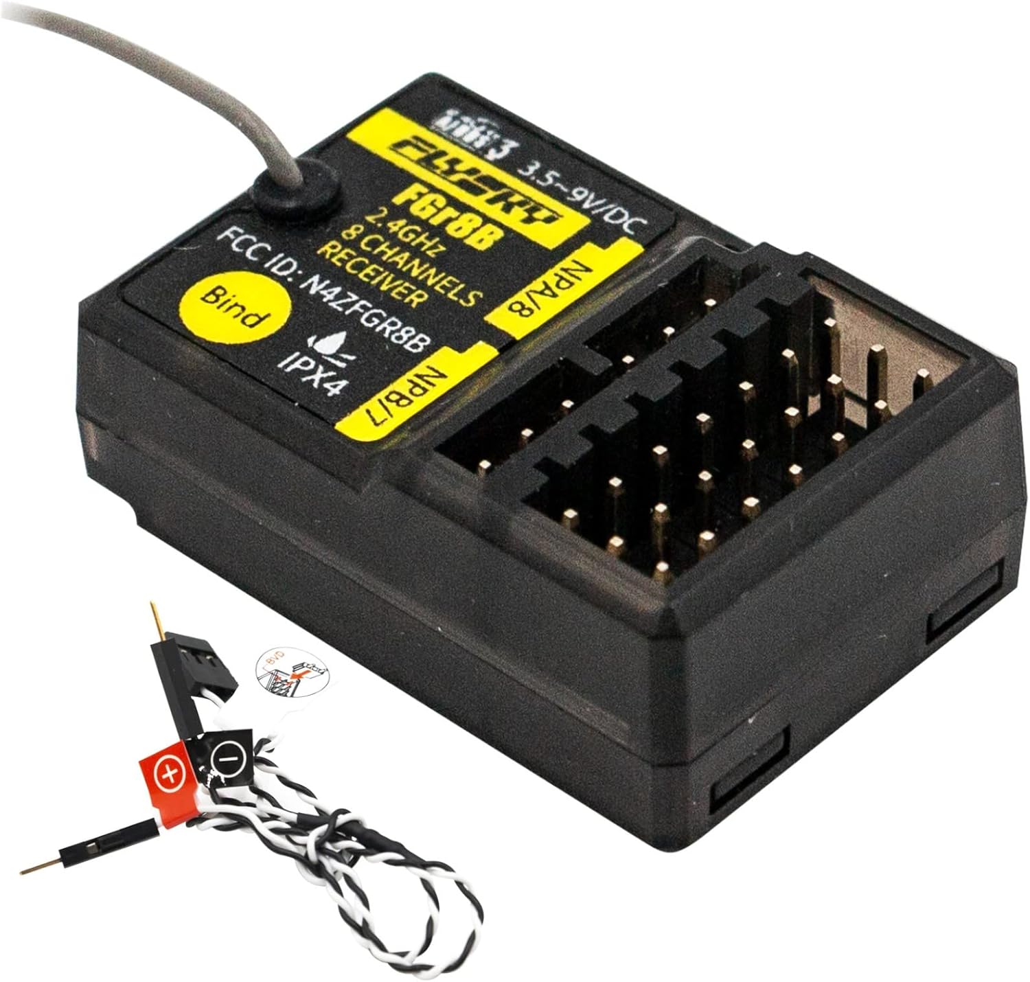 Top-down view of the Flysky FGr8B receiver with its antenna and ports