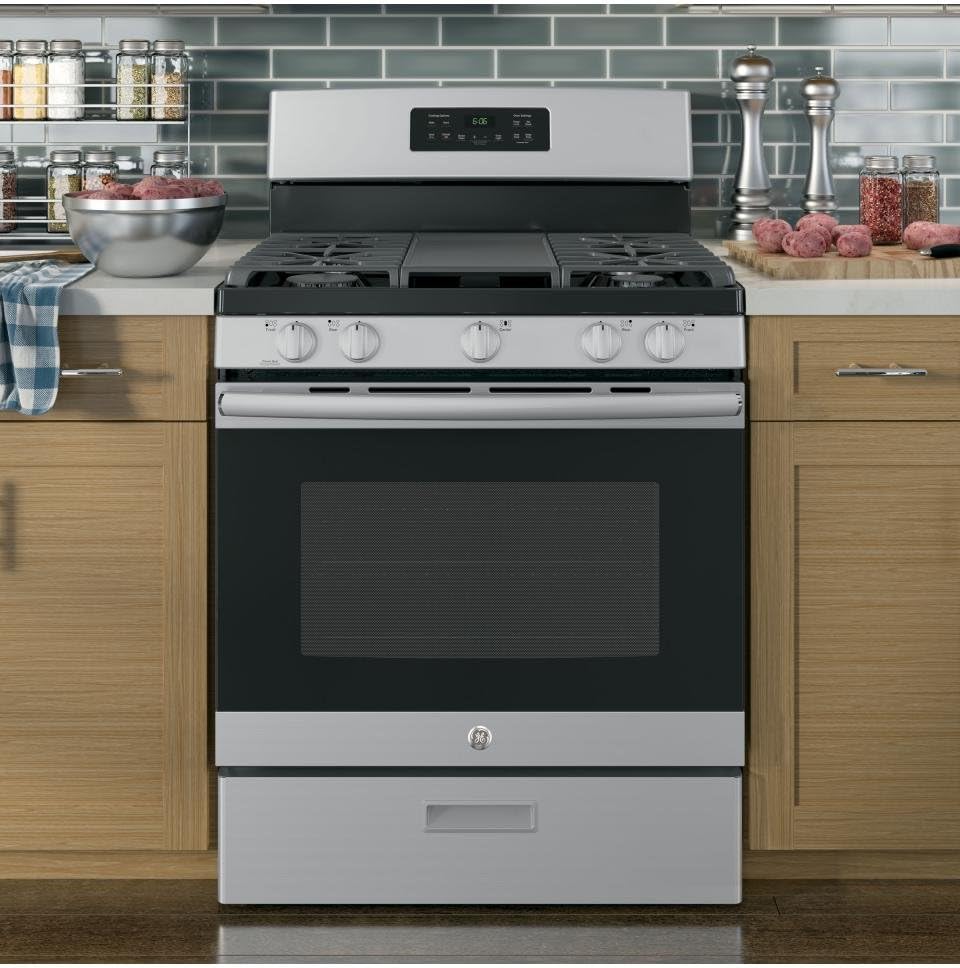 GE 30 Inch Free-Standing Gas Range, 5.0 cu. ft. Oven, 5 Sealed Burners, Broiler Drawer, Continuous Grates, Steam Clean, Simmer & Power Boil Burners, Non-Stick Griddle, Stainless Steel