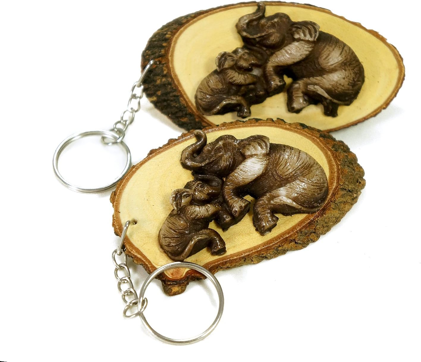 Twin oval wooden elephant key chain of two pieces one set.