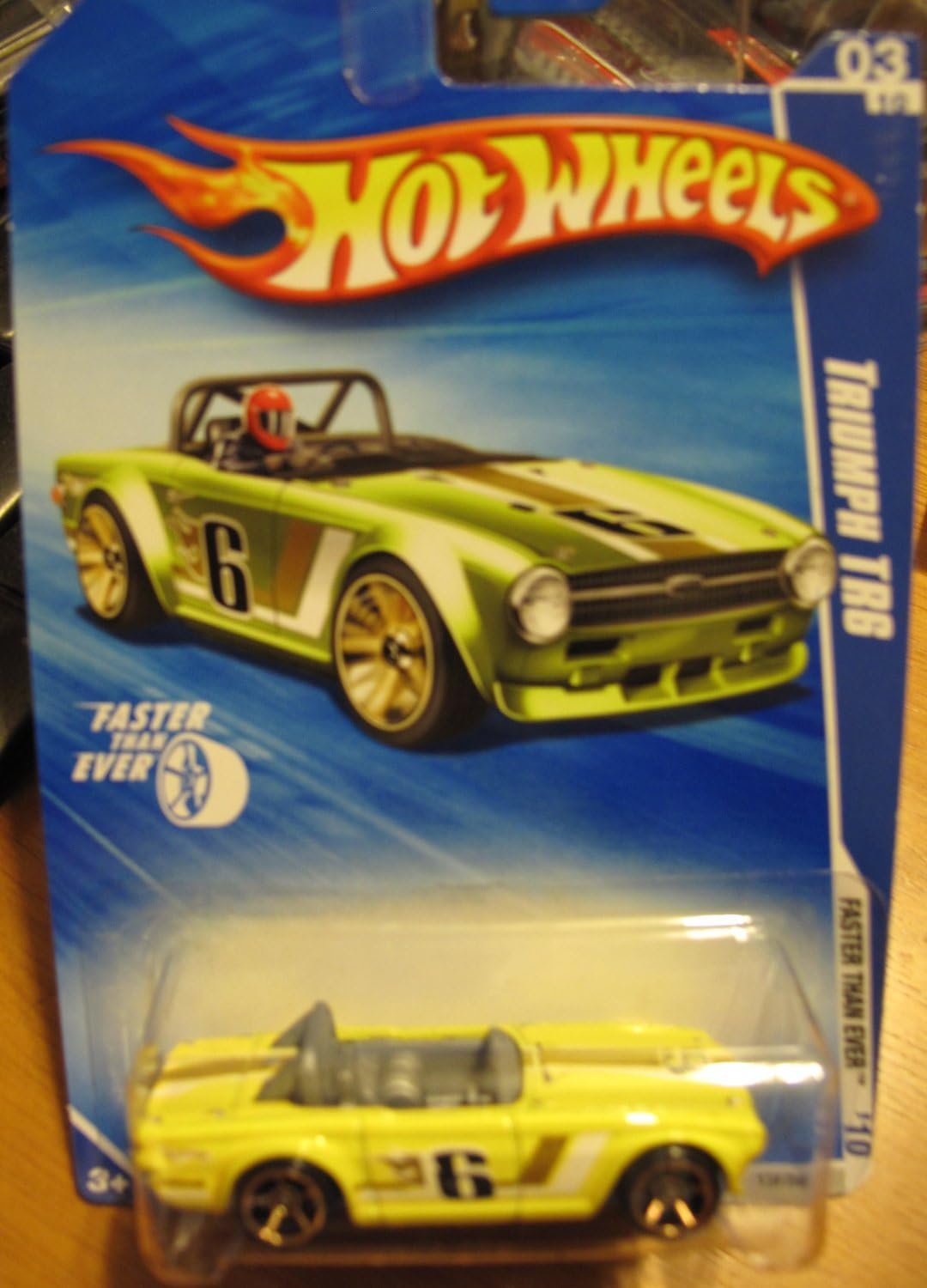 Hot Wheels 2010 Faster Than Ever Triumph TR6 YELLOW #131 KMART DAY EXCLUSIVE