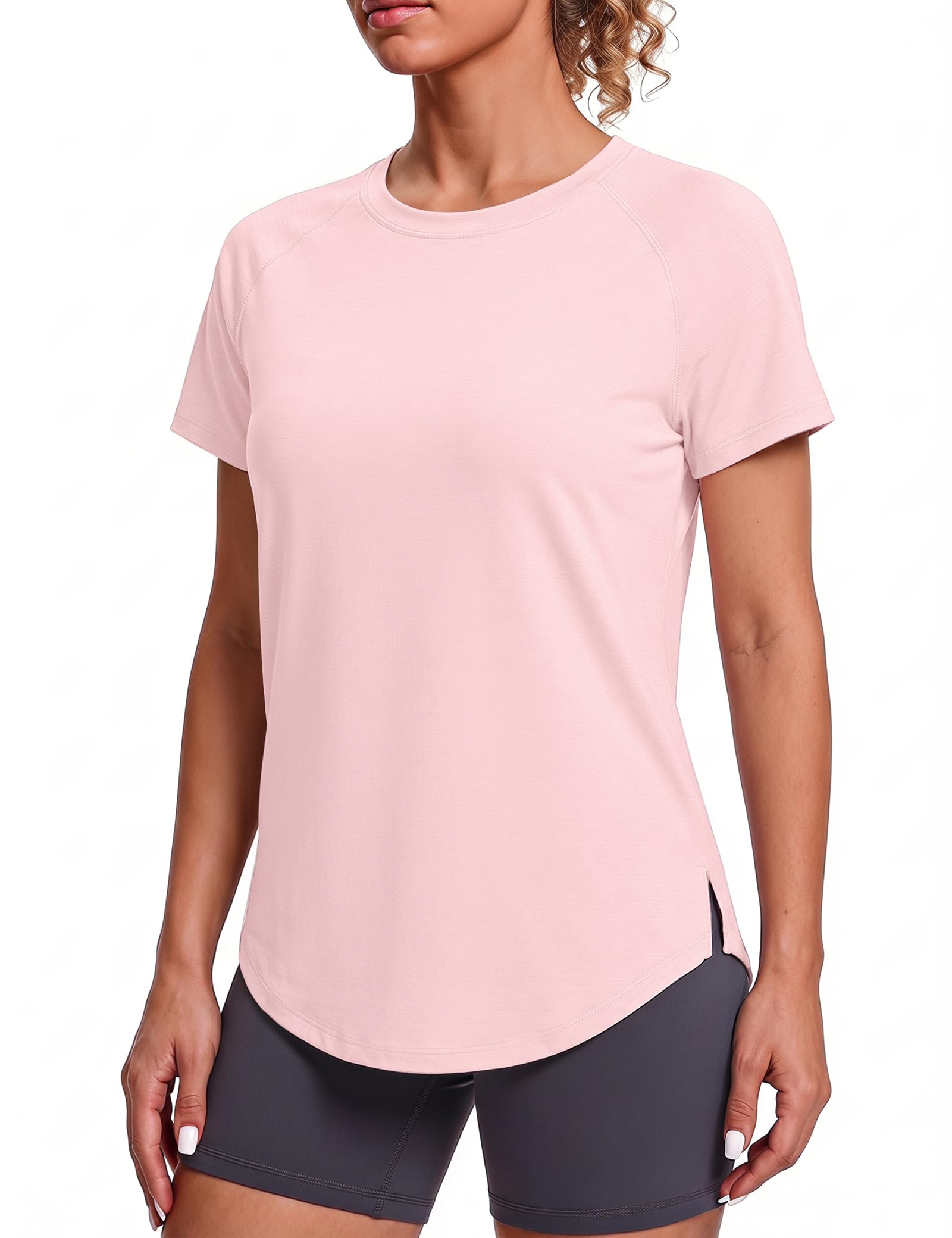 Gyabnw Women's Short Sleeve Open Back Sports T-Shirt | Round neckline, raglan sleeves, vertical slit at back; curved hem and stretch fabric to pair with leggings.