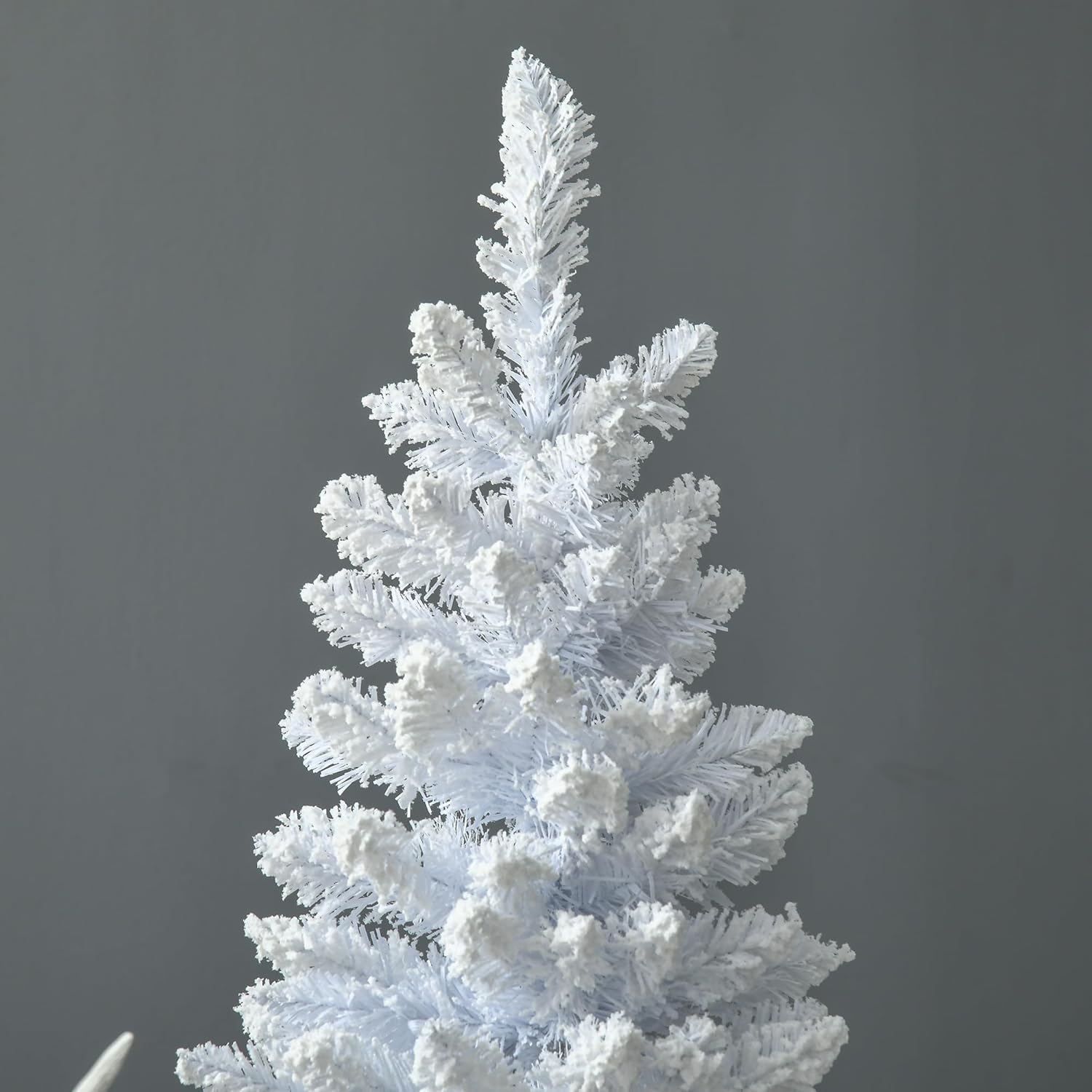Dimensions diagram of the HOMCOM 7ft Pencil Christmas Tree next to a 6ft human silhouette