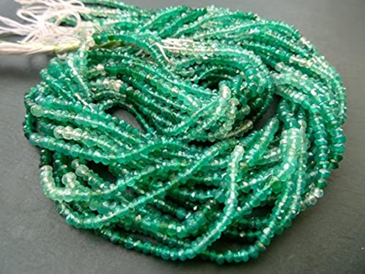 Onyx vert de 2 à 4 mm en lot de 5 rangs de perles rondelles facettées