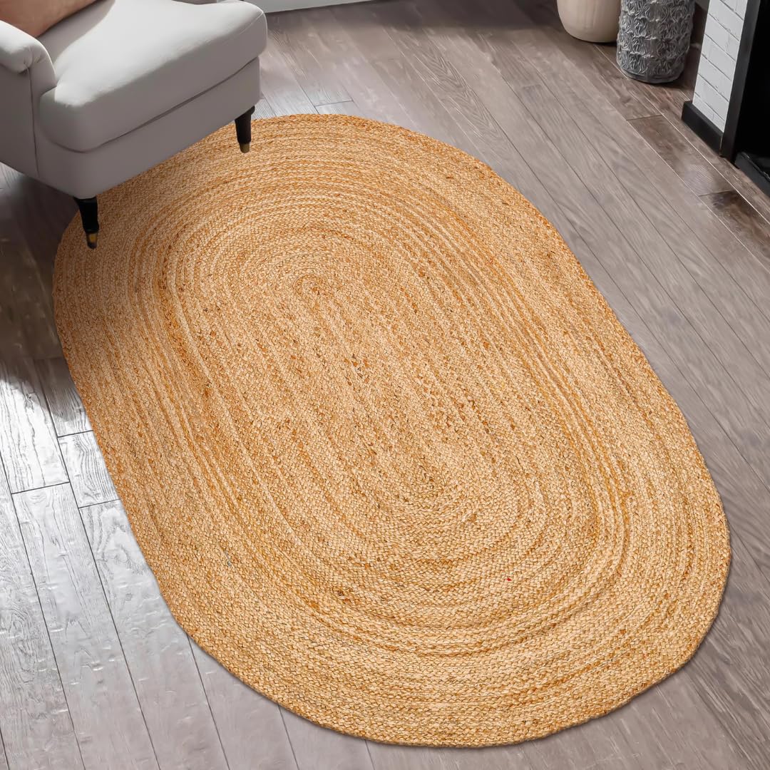 Photo 1 of OHOMLY LIVING Handcrafted Jute Braided Rug 3x5 Feet - 100% Natural Jute Area Rug - Rustic Farmhouse Boho Accent Rug for Living Room Bedroom Kitchen Hallway Entryway Reversible Handwoven Floor Rug