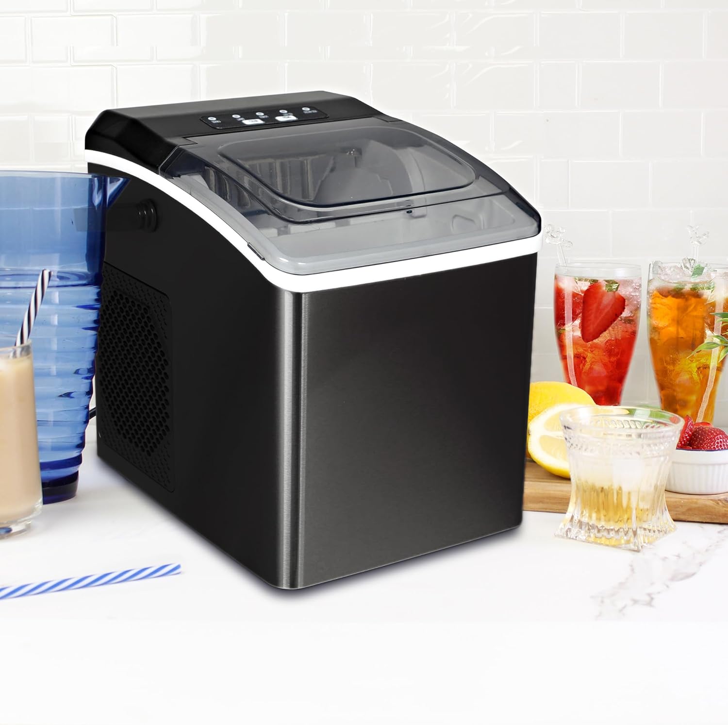 Koolatron Ice Maker placed on a kitchen countertop with drinks