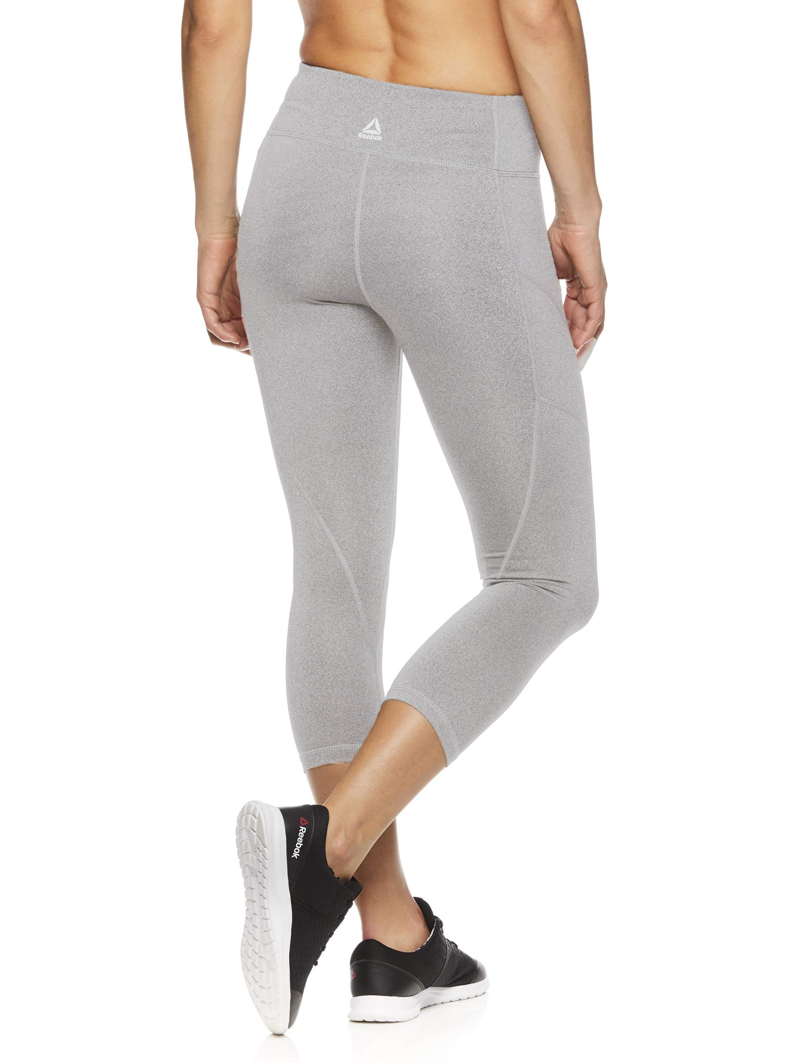 Reebok Leggings Capri estampados para mujer con cintura media y rendimiento de compresión