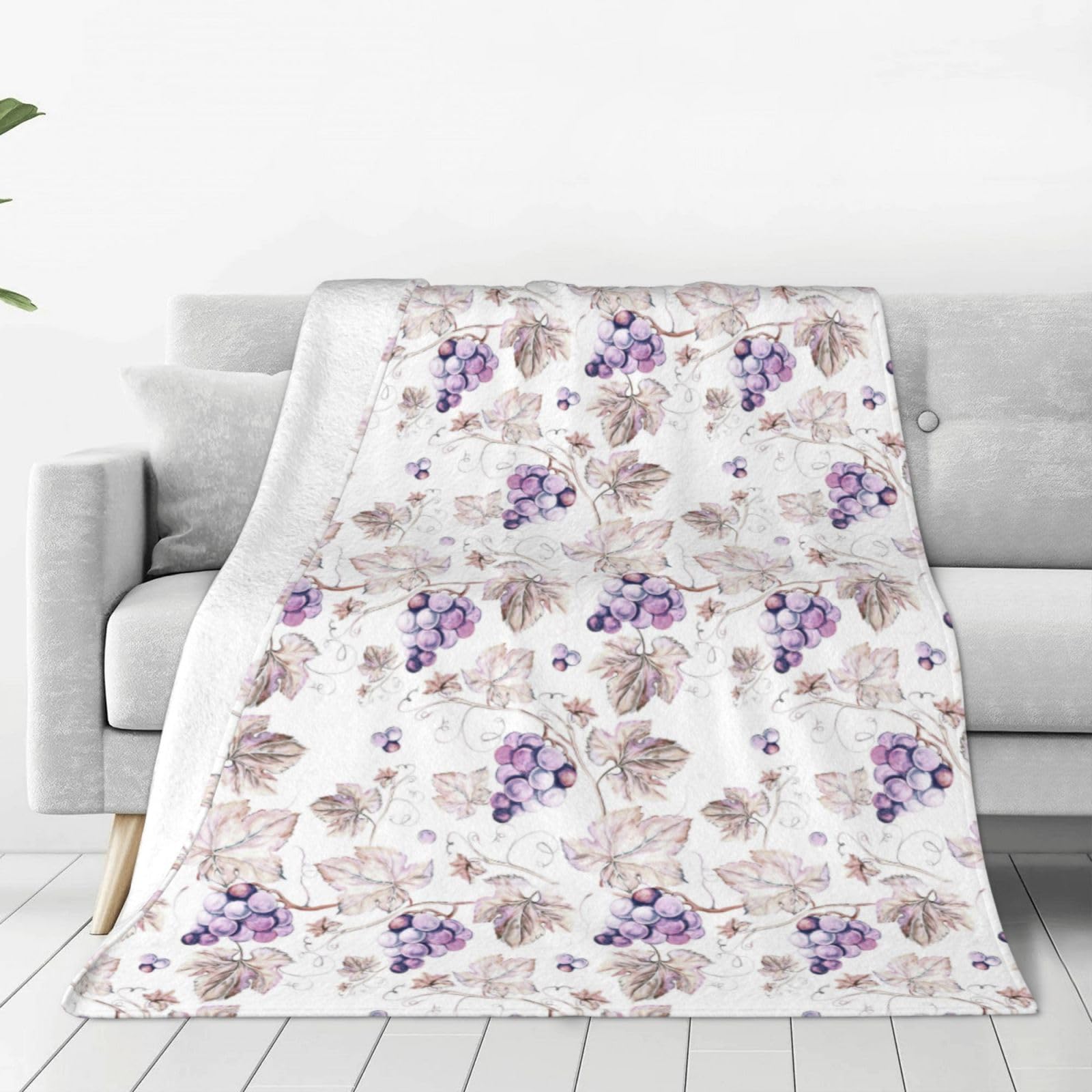 Couverture douce en flanelle motif feuilles de vigne pour réchauffer vos soirées au salon