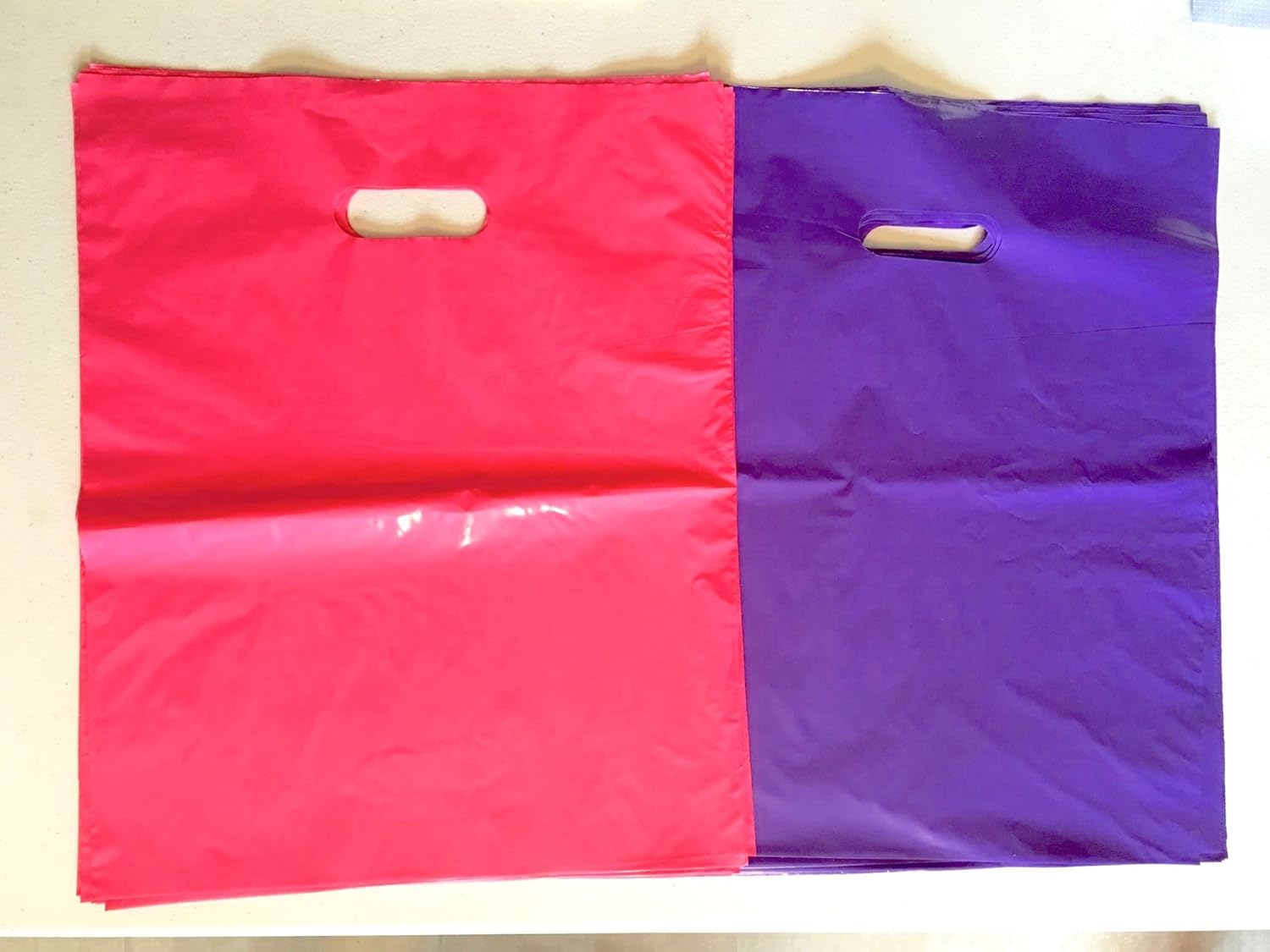 200 Pack Mix Glossy HOT Pink & Purple Opaque Cut Out Handle 9 x 12 inch Size Retail Merchandise Plastic Bags