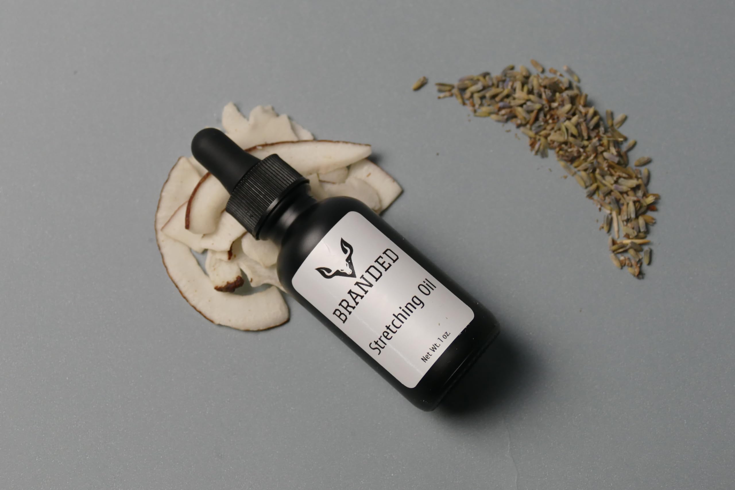Amazon.com: Branded Ear Stretching Oil, Piercing Aftercare. Stretch  Lubricant for Plugs and tapers.