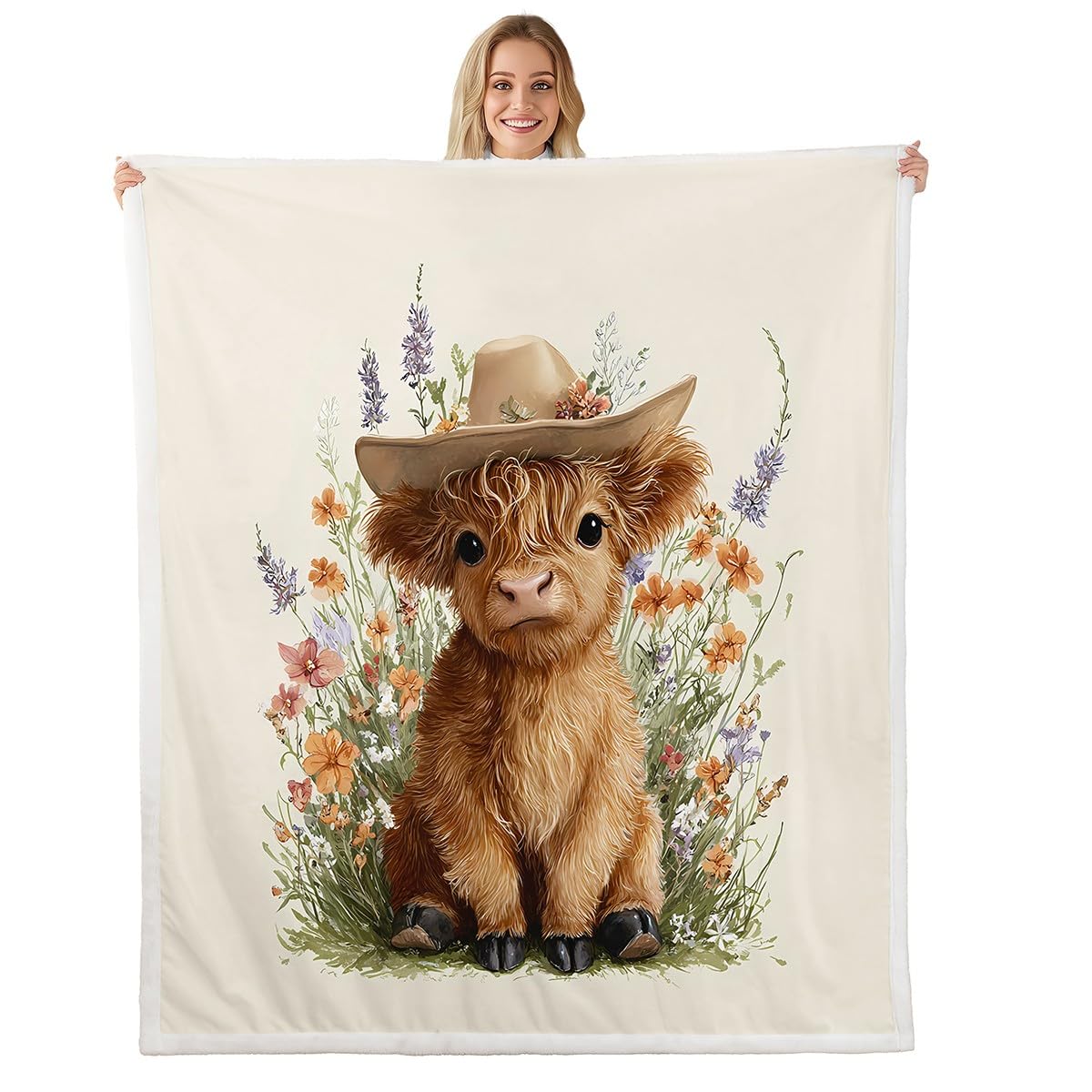 Couverture vache Highland polaire anti-froid pour enfants sur le canapé