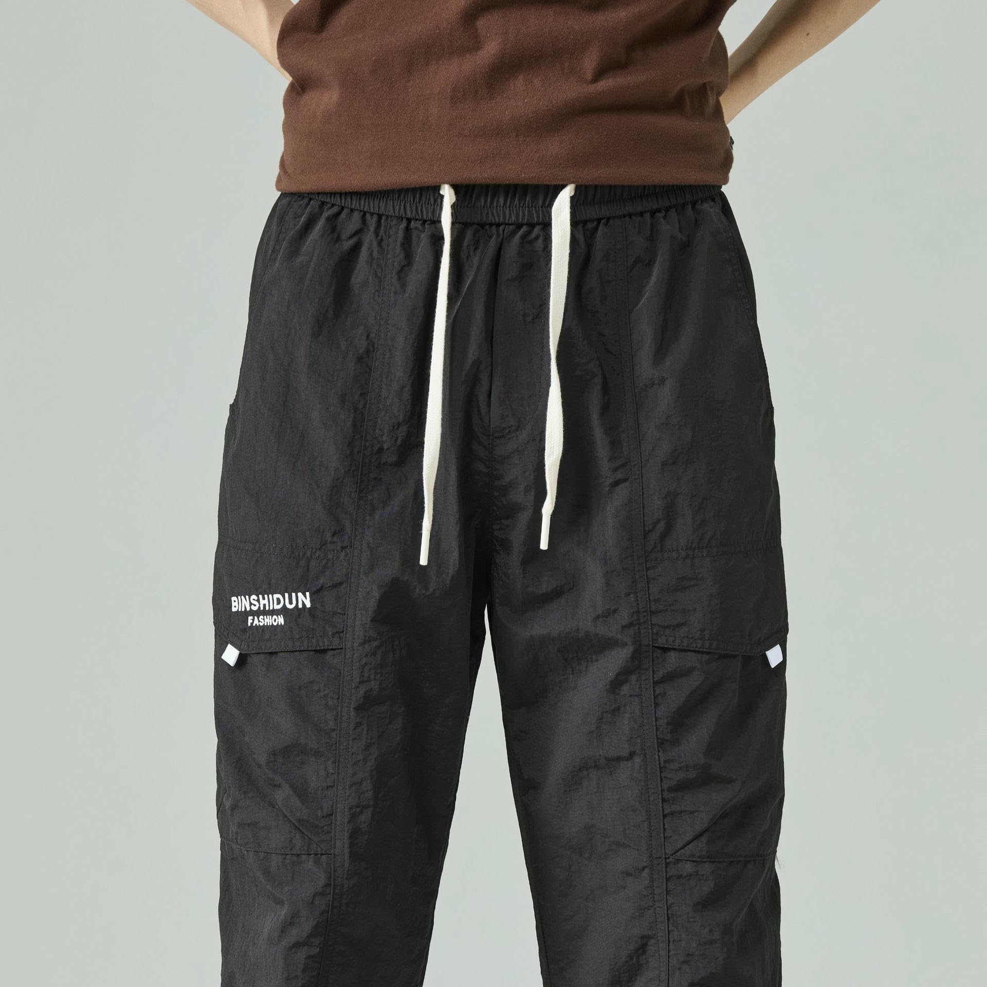 Pantaloni casual da lavoro versatili larghi in nylon sottile primavera estate da uomo