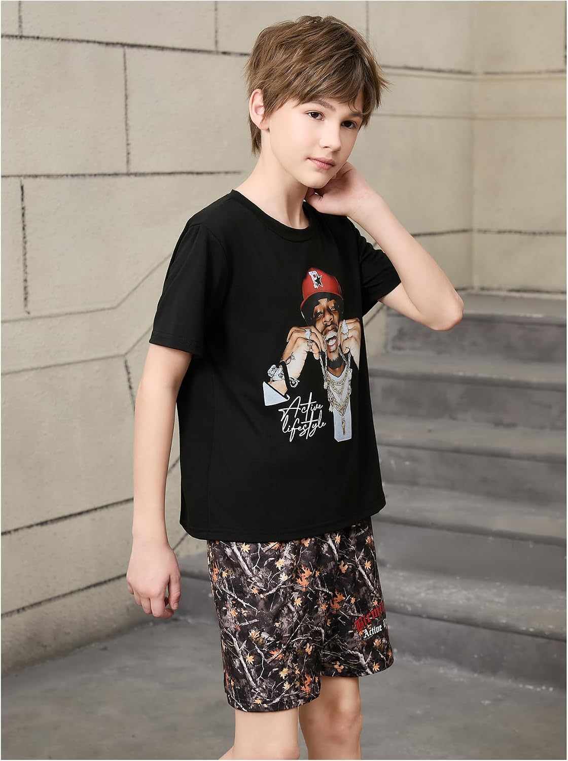 Verdusa Boy's 2 Piece Hip Hop Outfits Graphic Crewneck Tee Top and Letter Print Camo Shorts Set