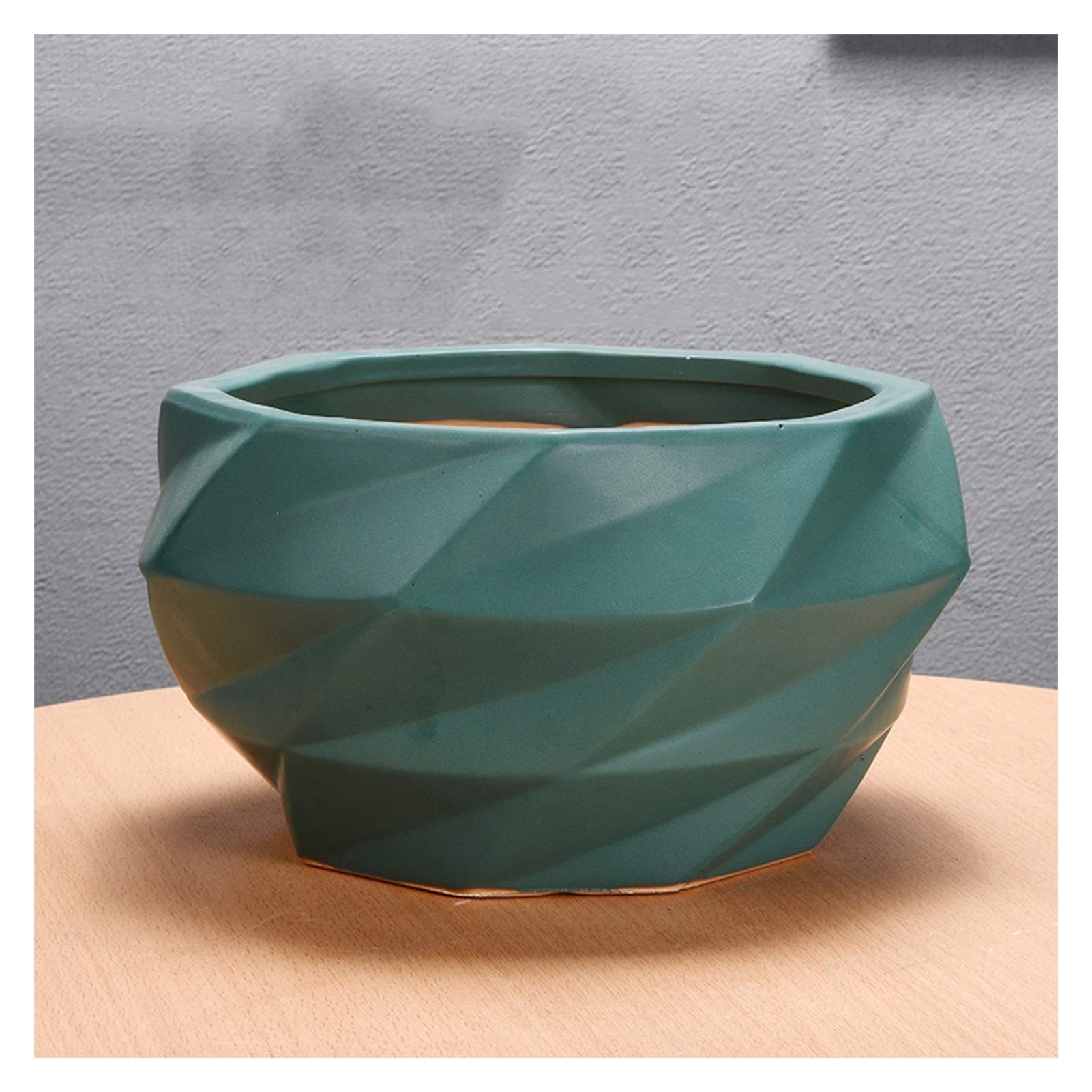 Pot de fleurs noir géométrique moderne pour végétaliser votre terrasse ou bureau