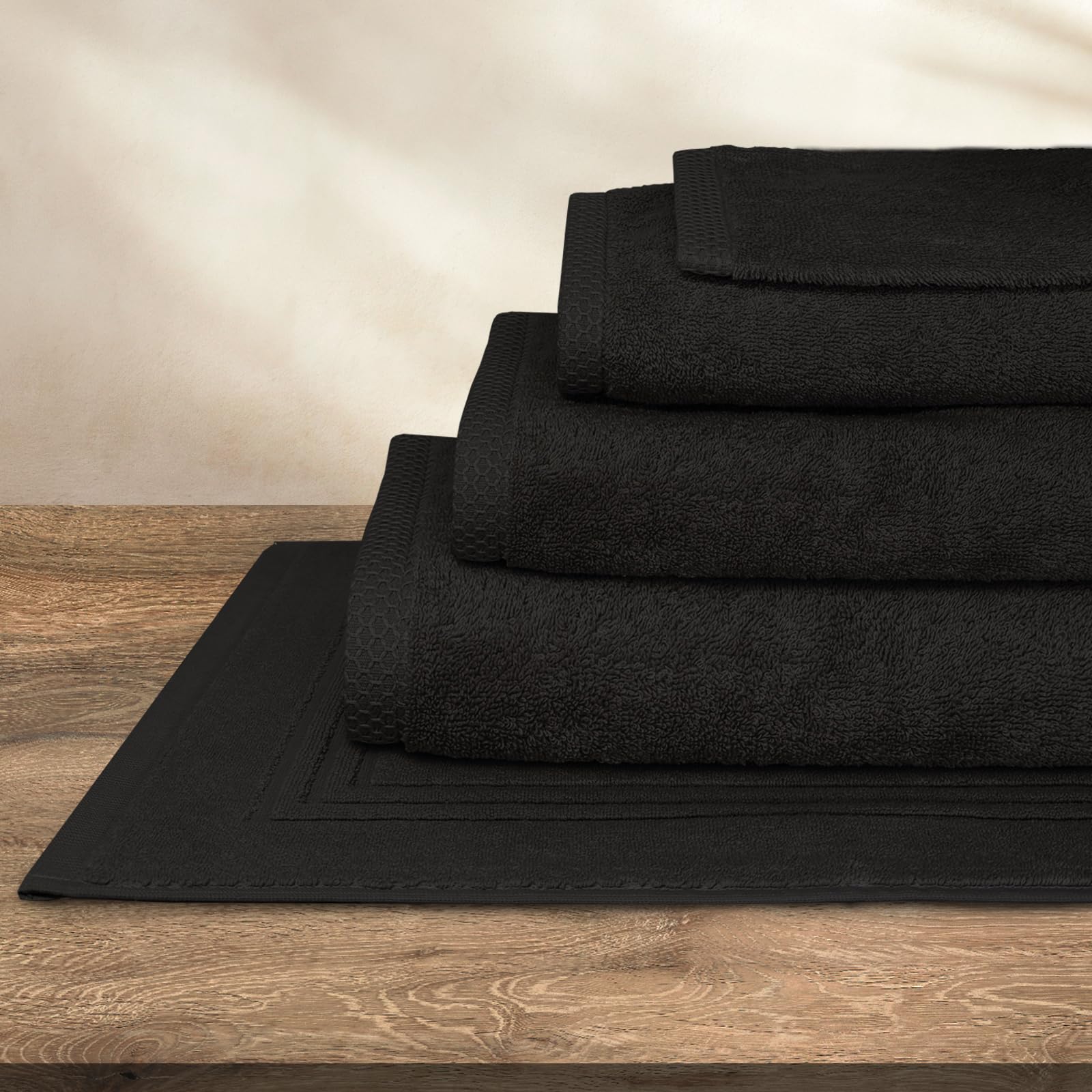 SLEEPZEN - Juego de Toallas de Baño 70x140, Juego de 4 - Negro, en Algodón Orgánico Certificado Gots - 500 g/m² - Ultra absorbentes - Extra Suaves - Fabricadas en Portugal - Certificadas Oeko-Tex